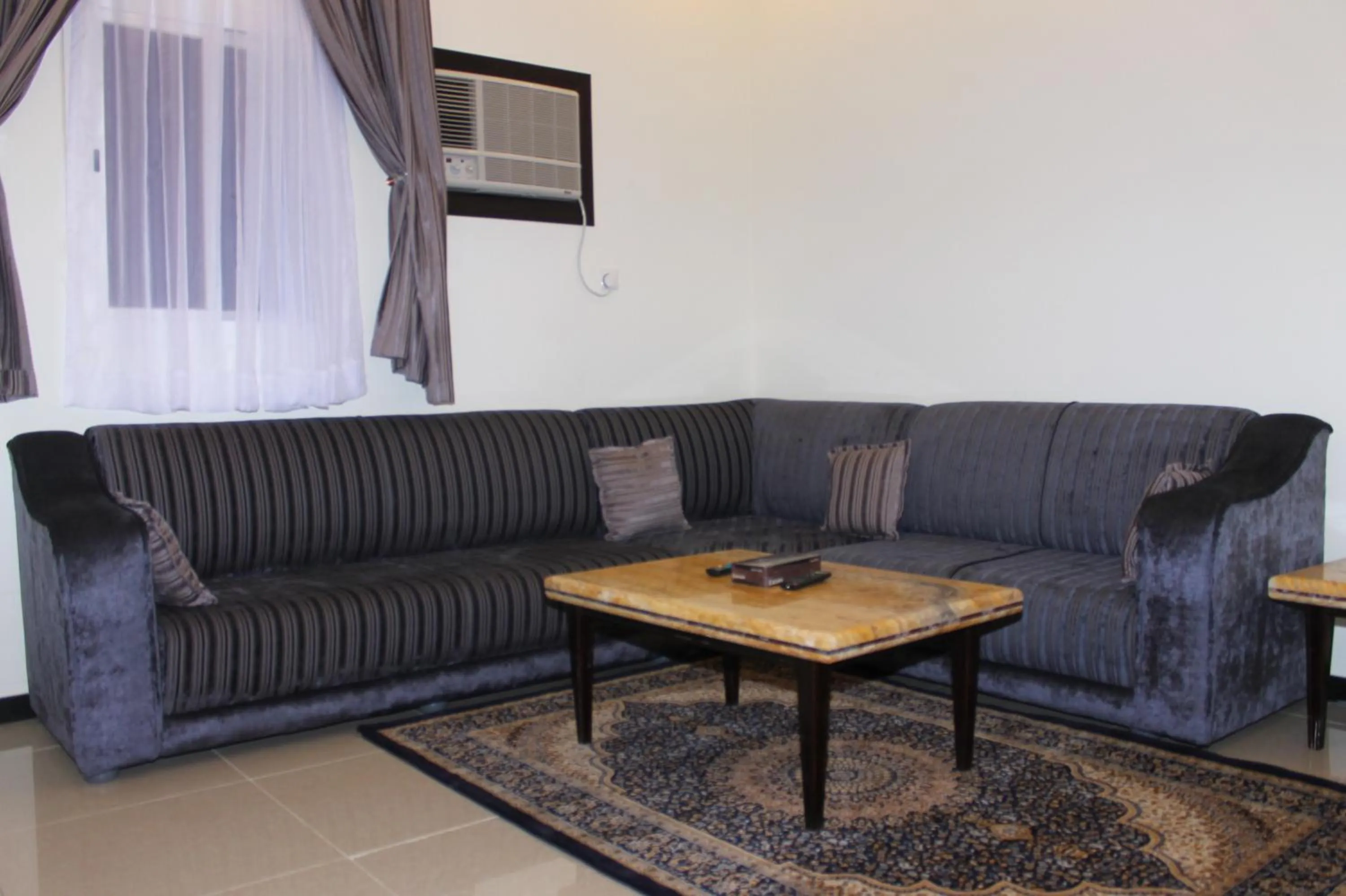 Living room in فخامة الديار للشقق المخدومة Fakhamat Aldyar For Serviced Apartments