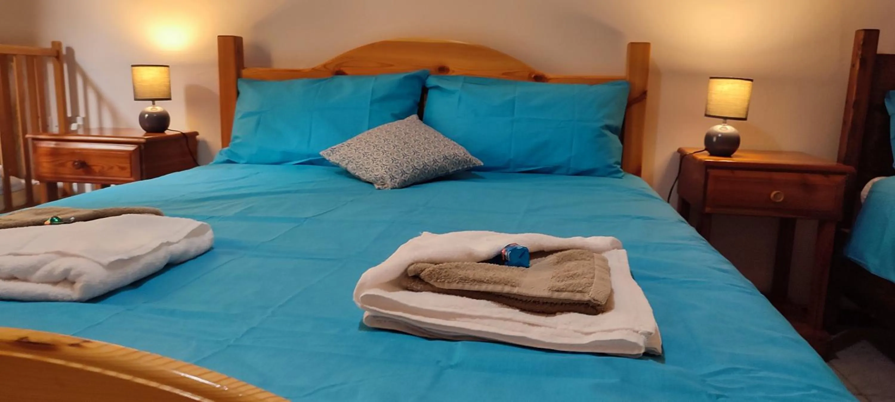 Bed in Grotto's Paradise B&B