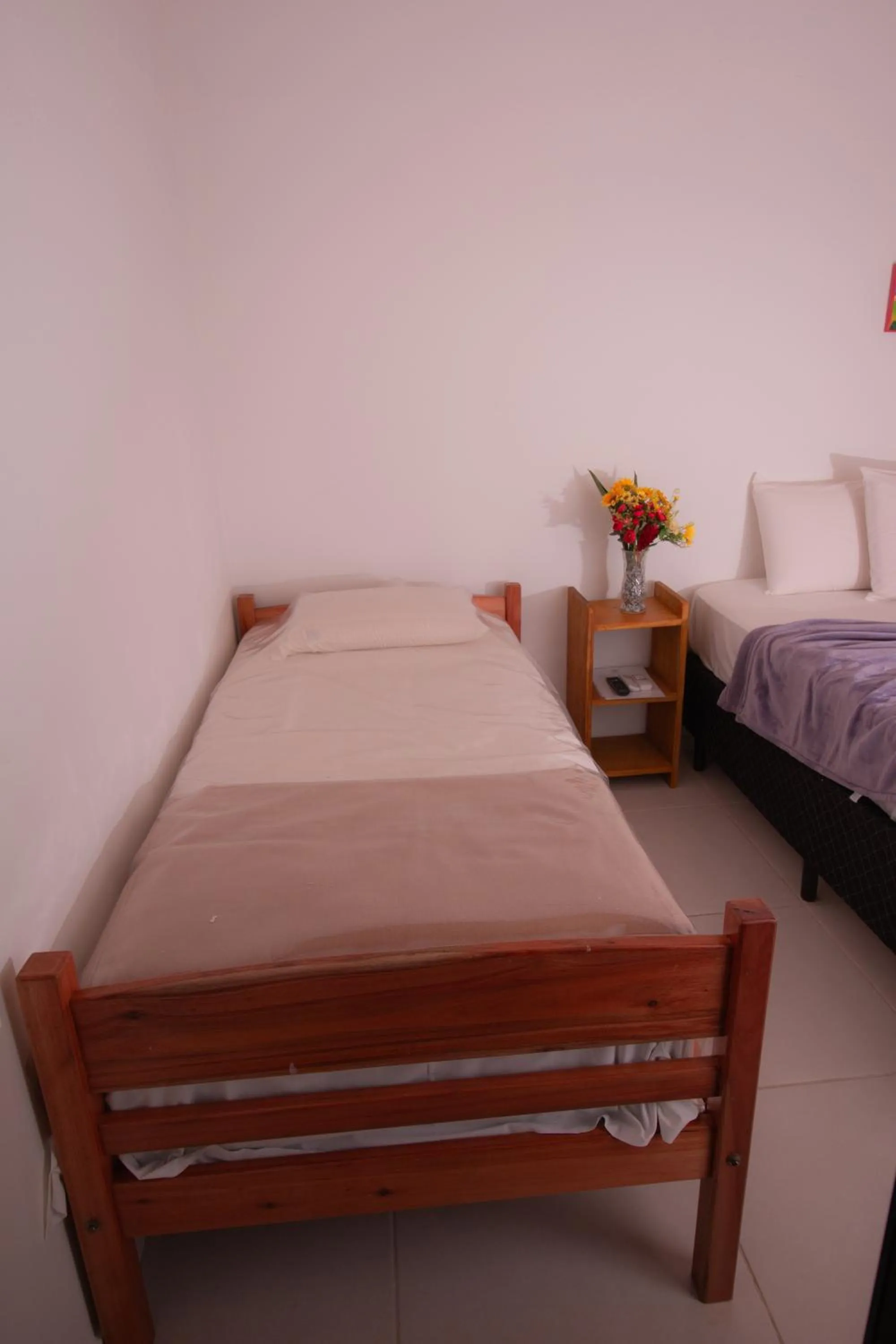 Bed in Pousada do Mineiro
