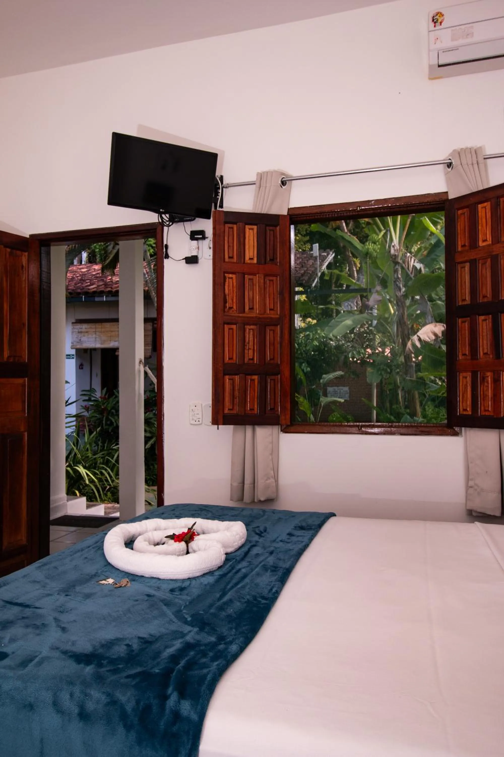 Bed in Pousada do Mineiro