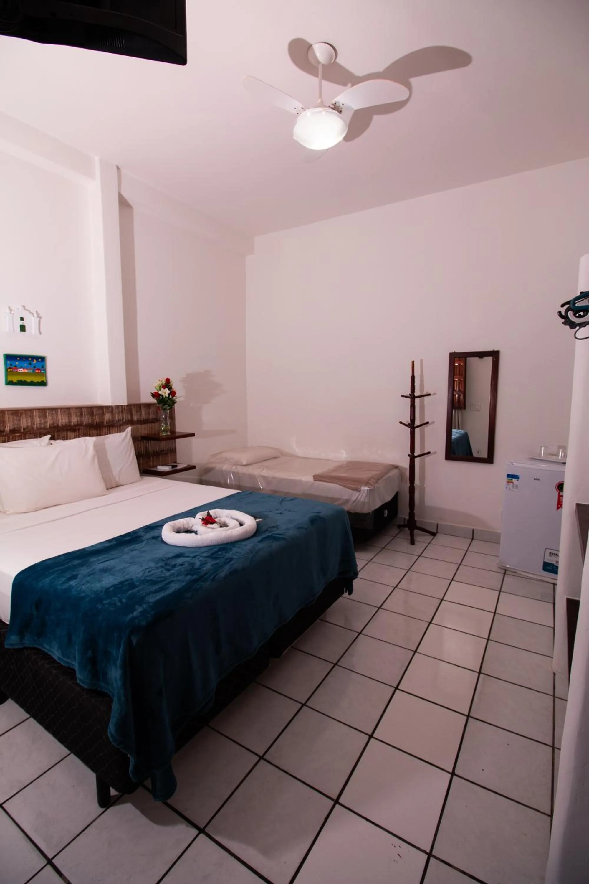 Bed in Pousada do Mineiro