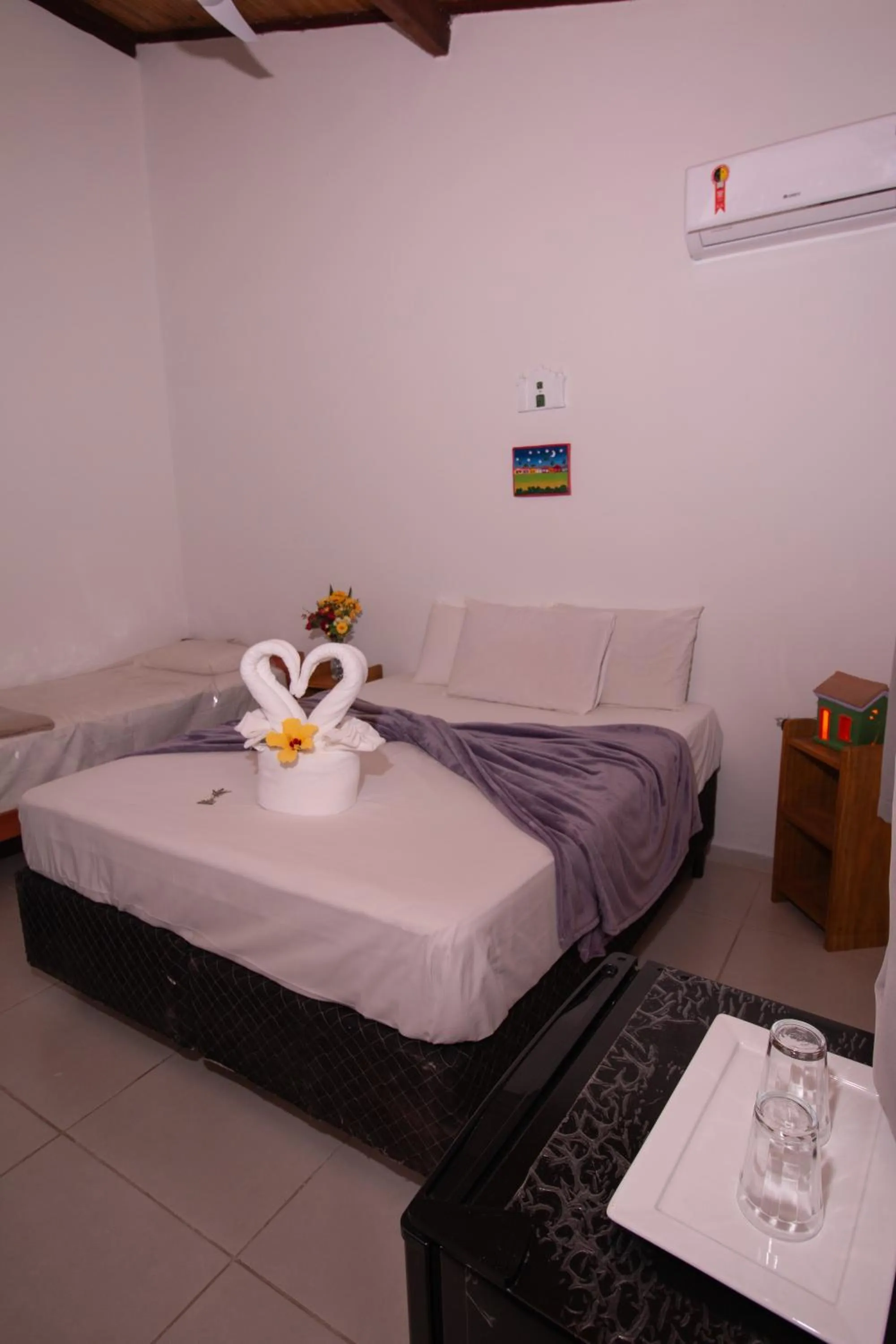 Bed in Pousada do Mineiro