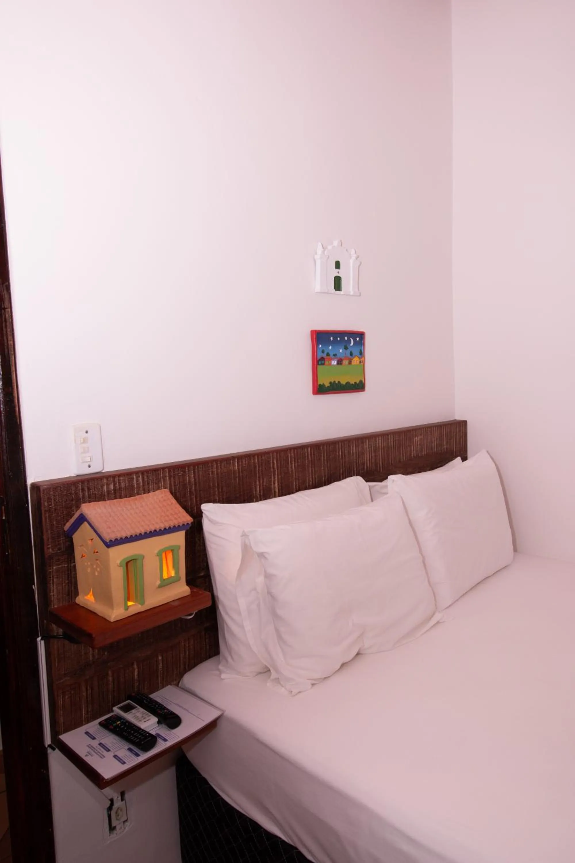 Bed in Pousada do Mineiro