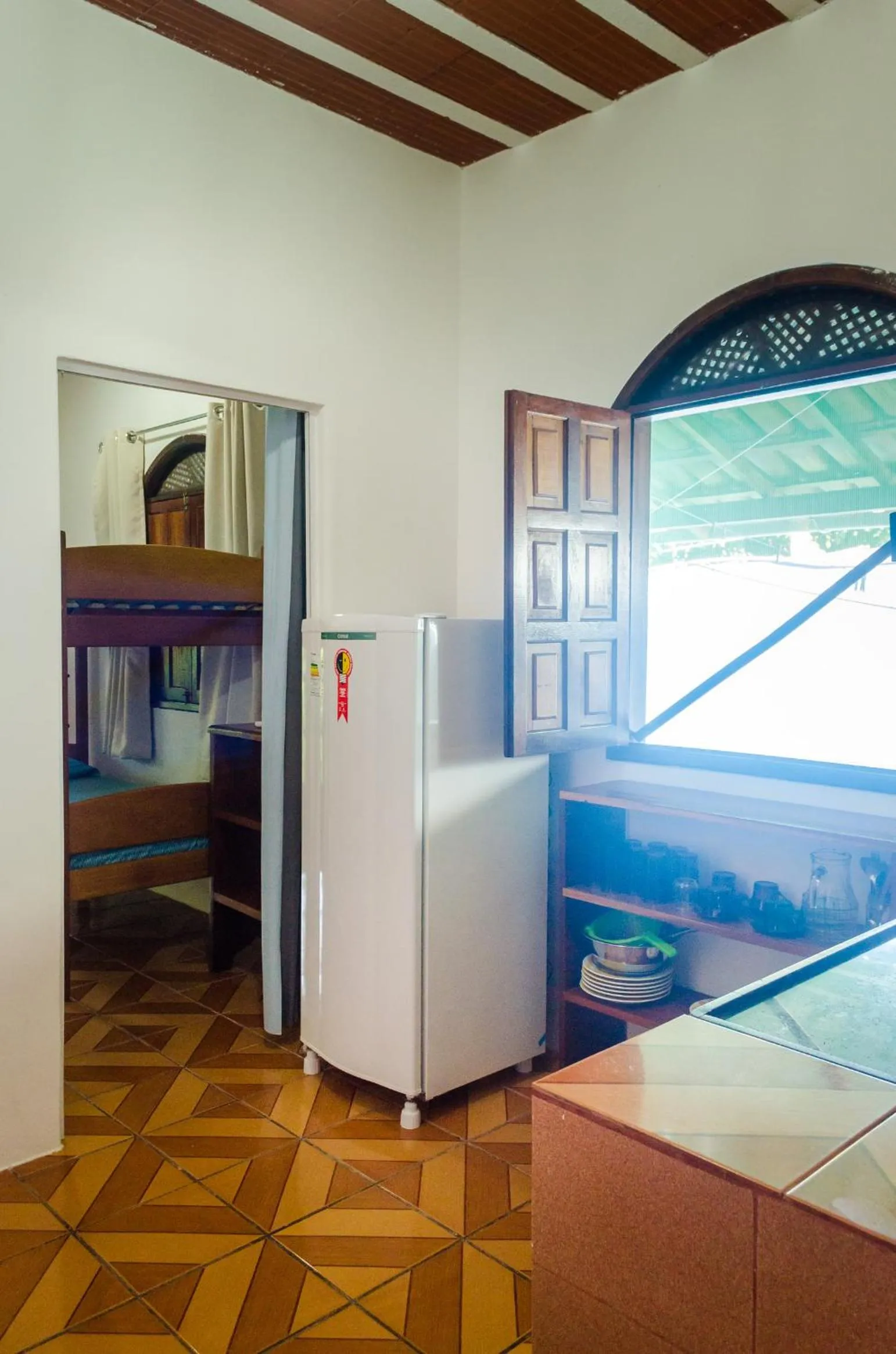 Kitchen or kitchenette in Pousada do Mineiro