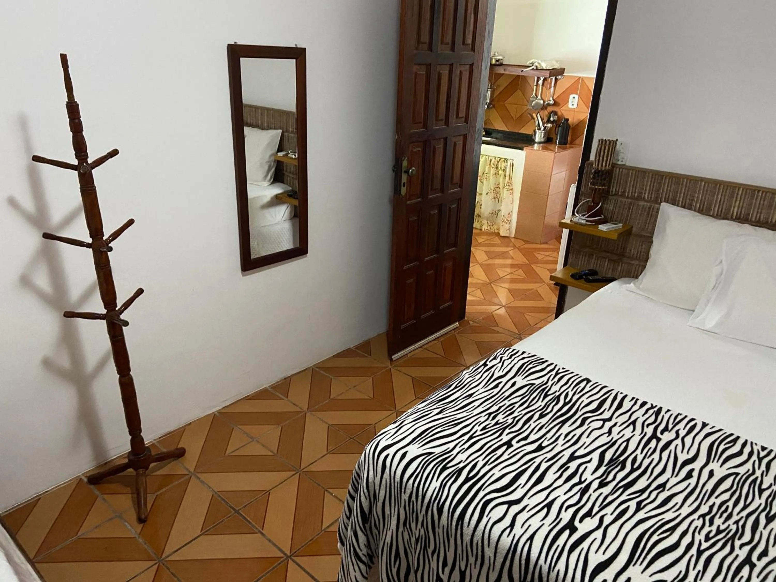 Bed in Pousada do Mineiro