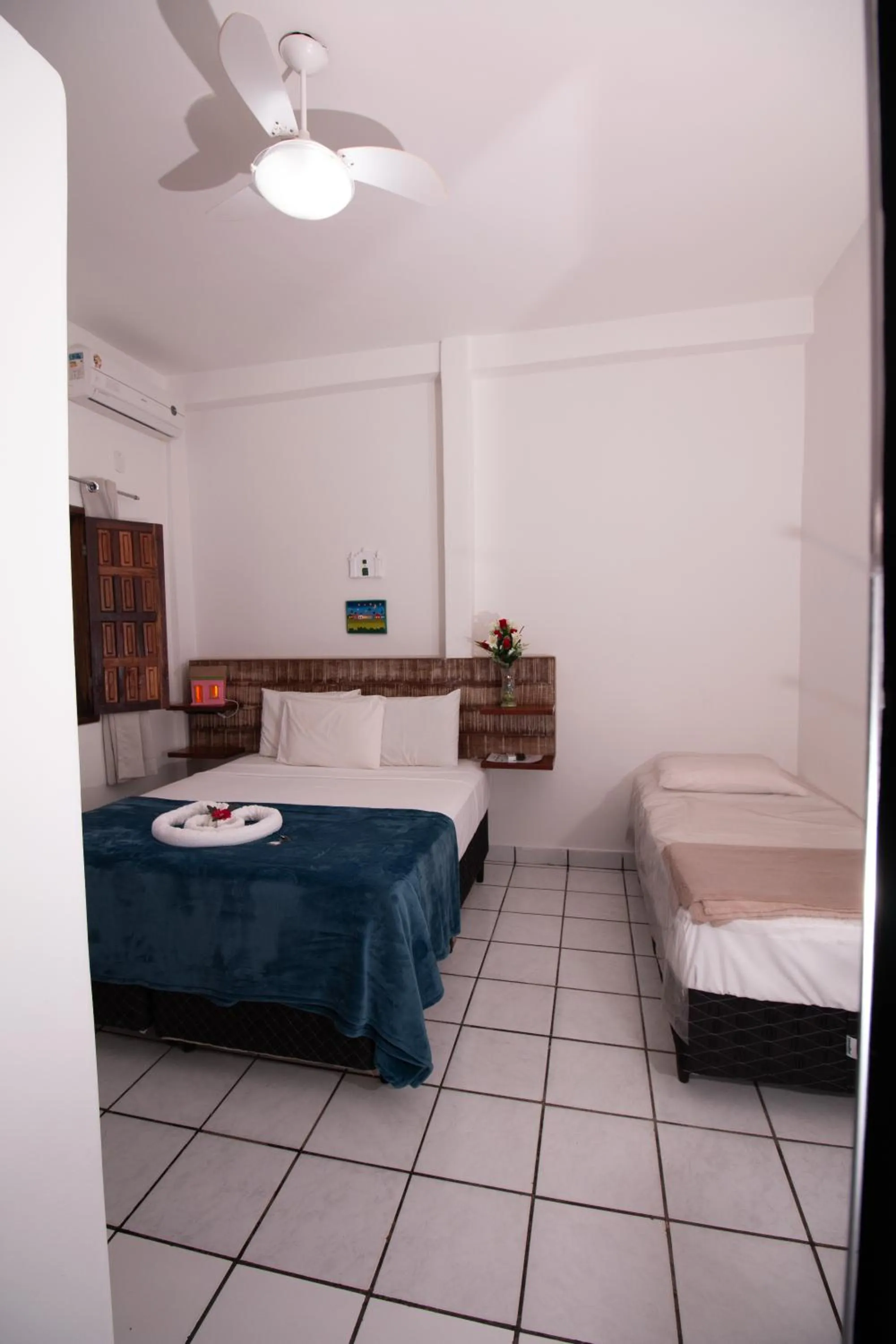 Bed in Pousada do Mineiro