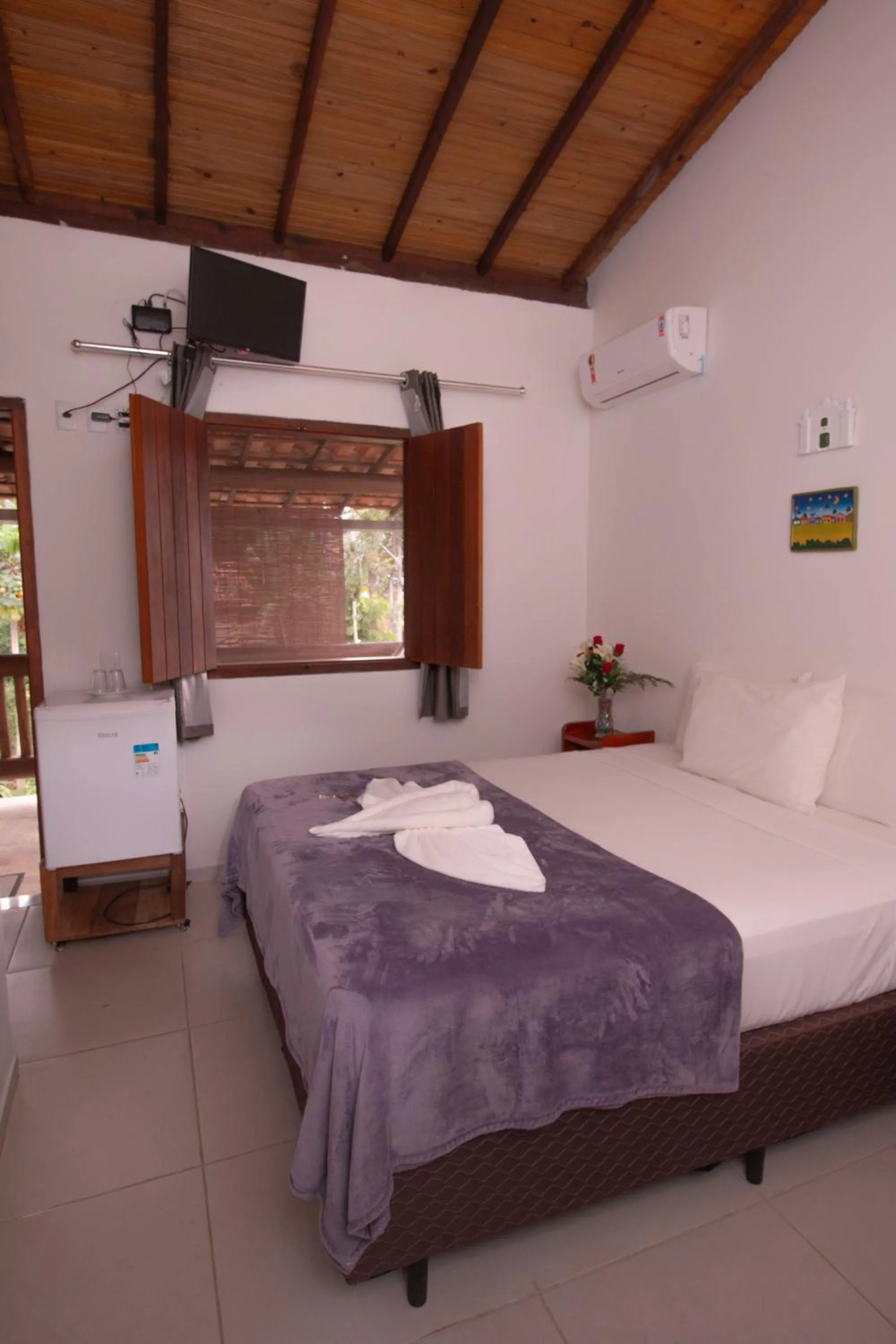 Bed in Pousada do Mineiro