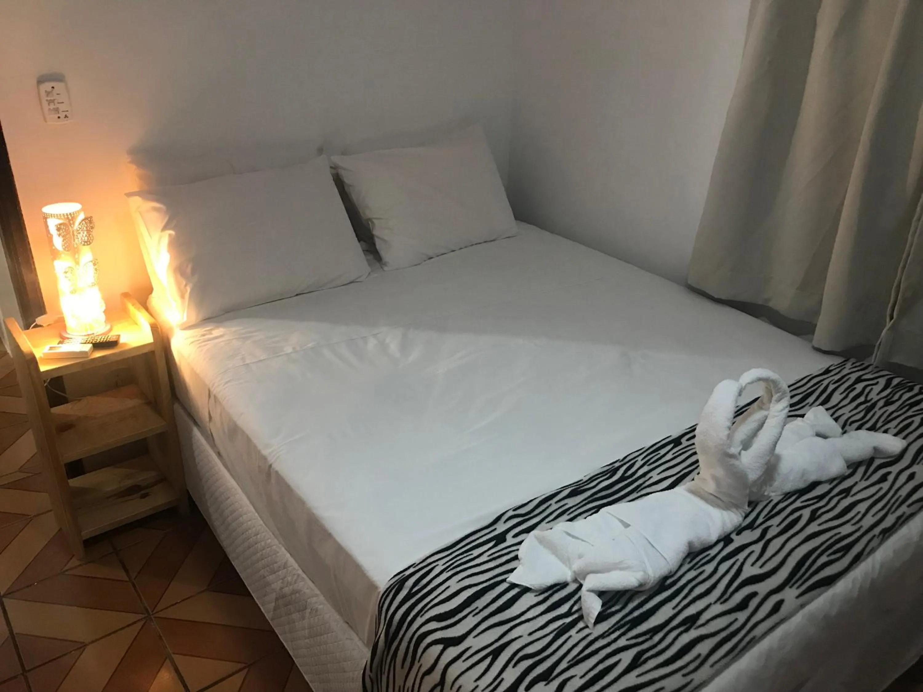 Bed in Pousada do Mineiro