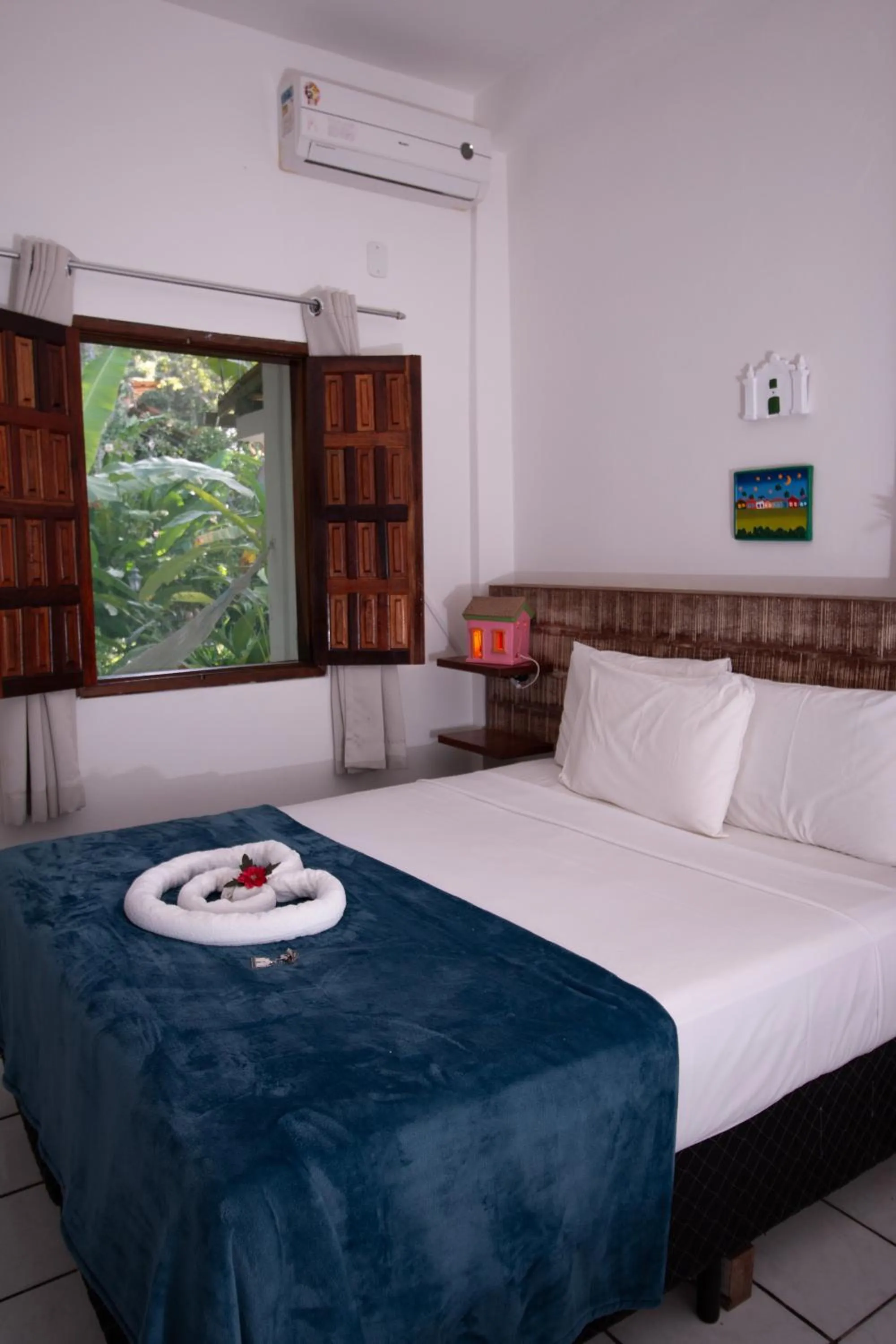 Bed in Pousada do Mineiro