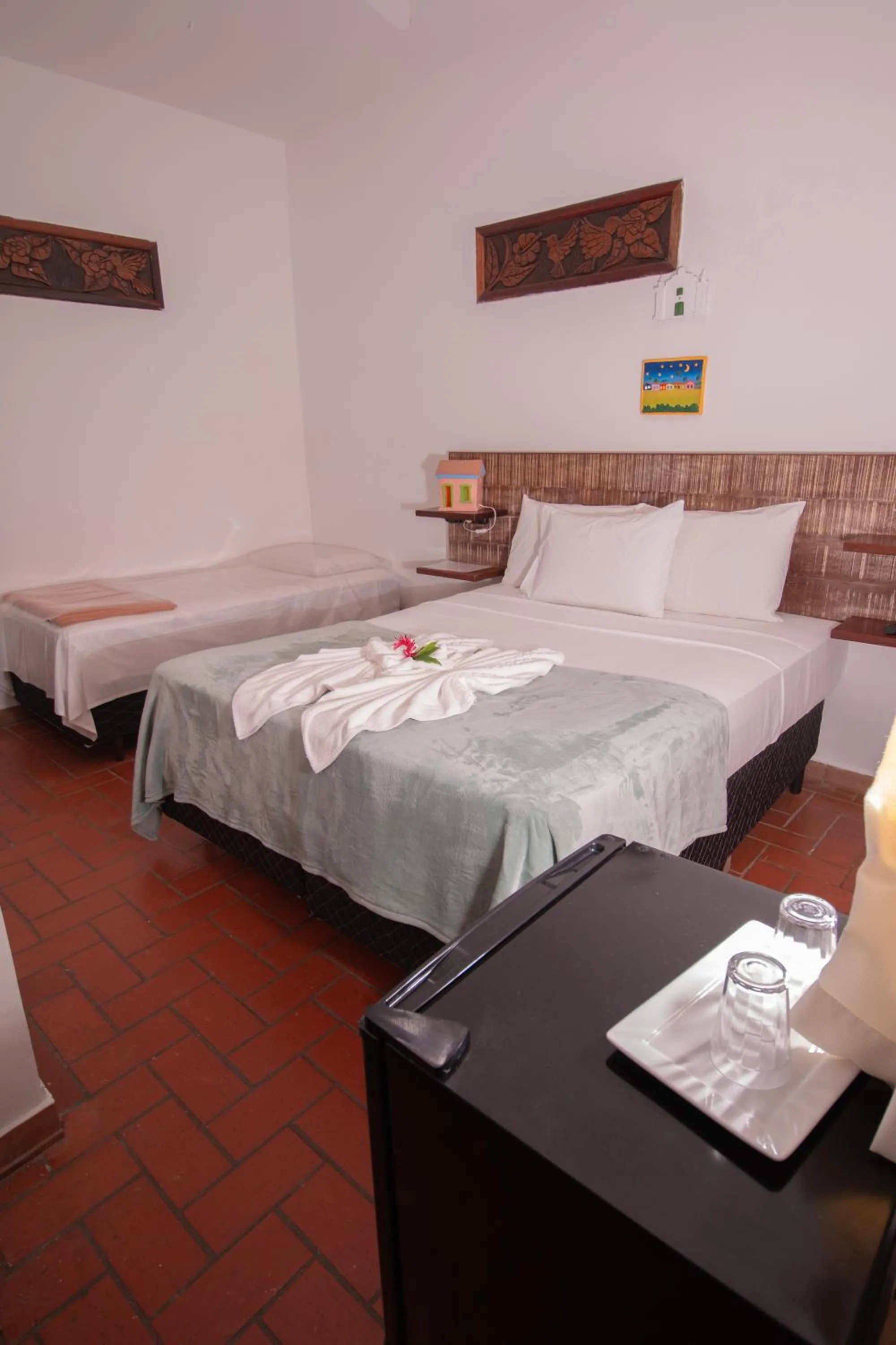 Bed in Pousada do Mineiro