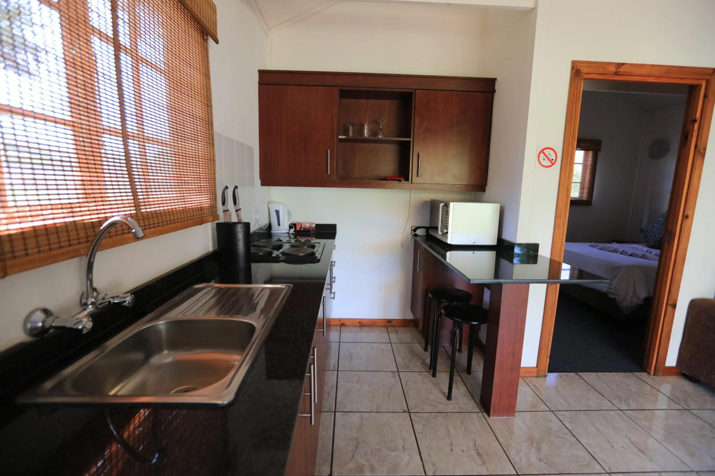 Kitchen or kitchenette in Kruger View Chalets