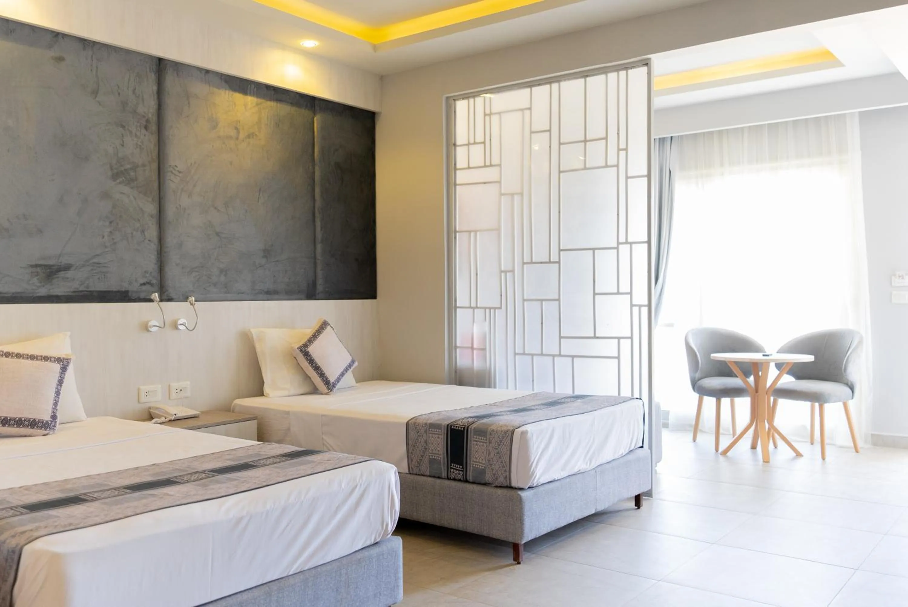 Photo of the whole room, Bed in Aladdin Beach Resort