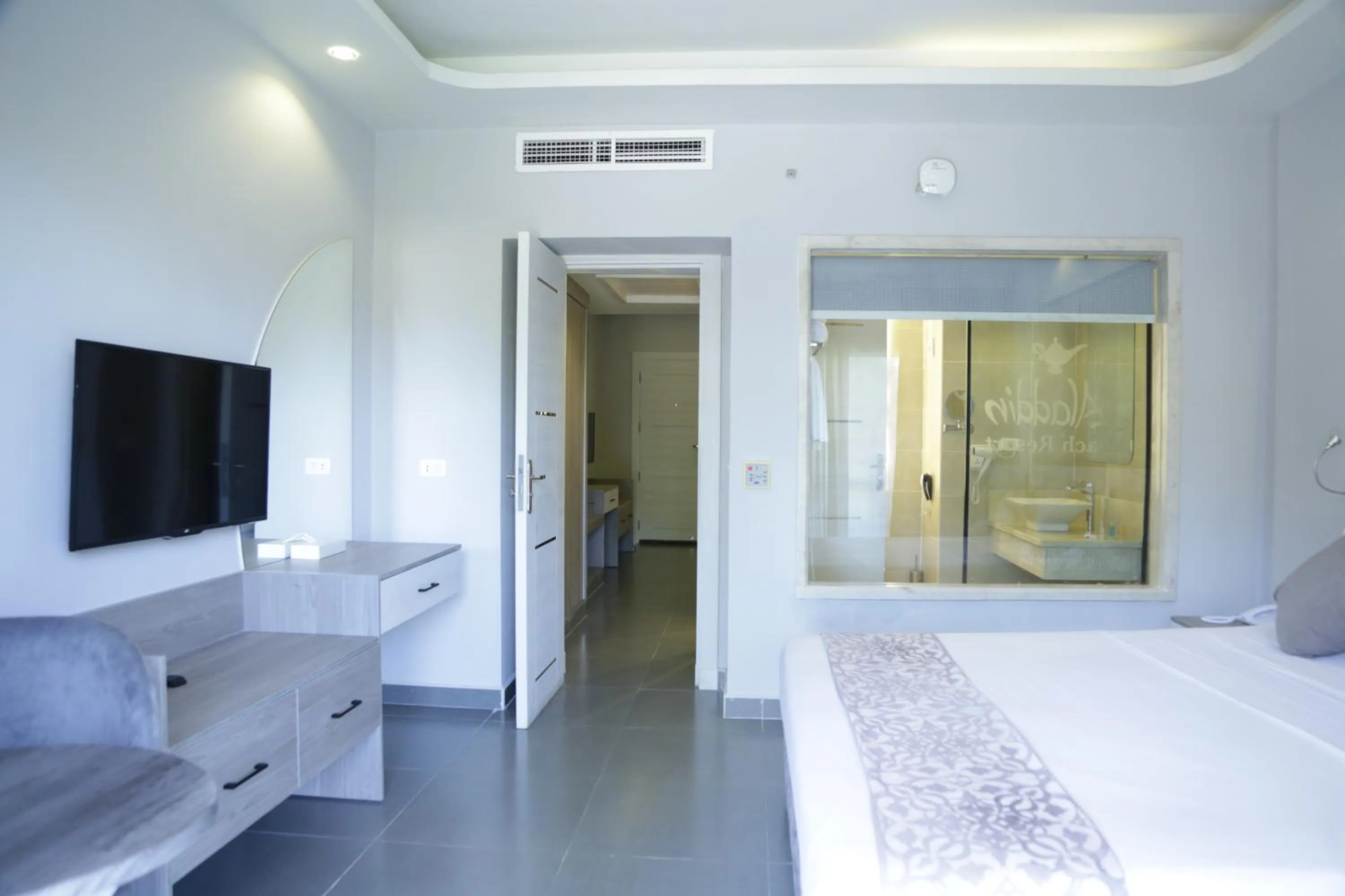 Photo of the whole room, Bed in Aladdin Beach Resort