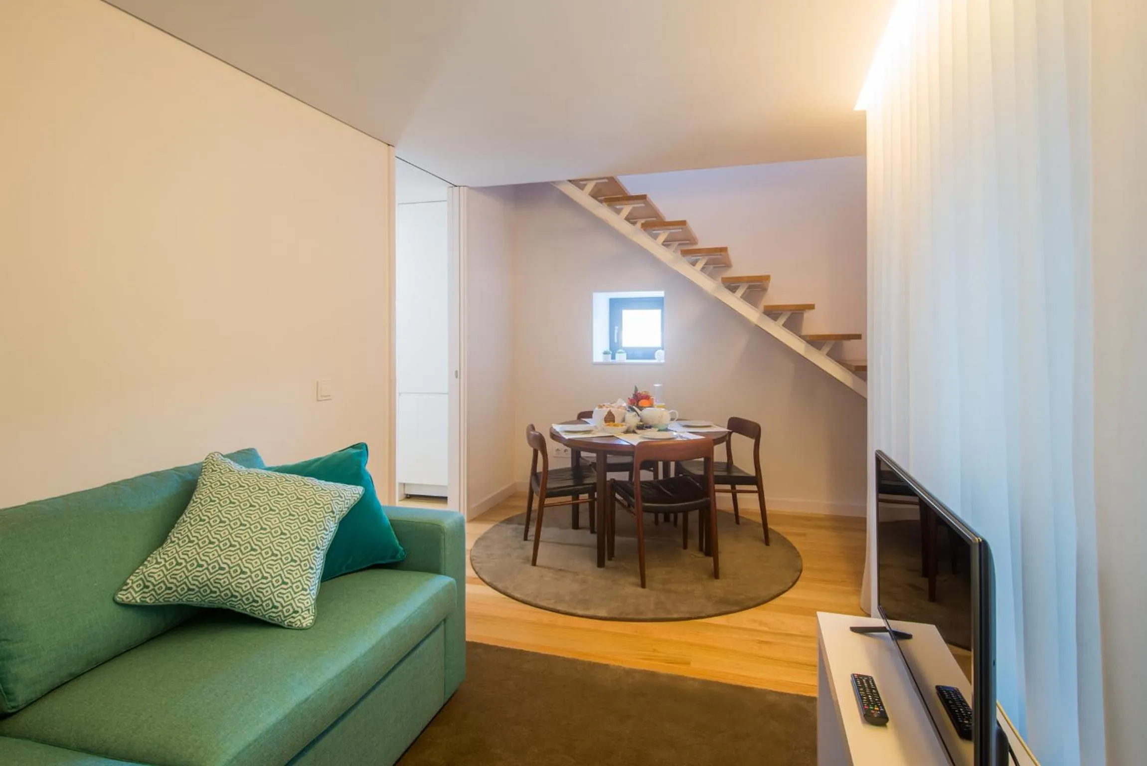 Communal lounge/ TV room in Domum