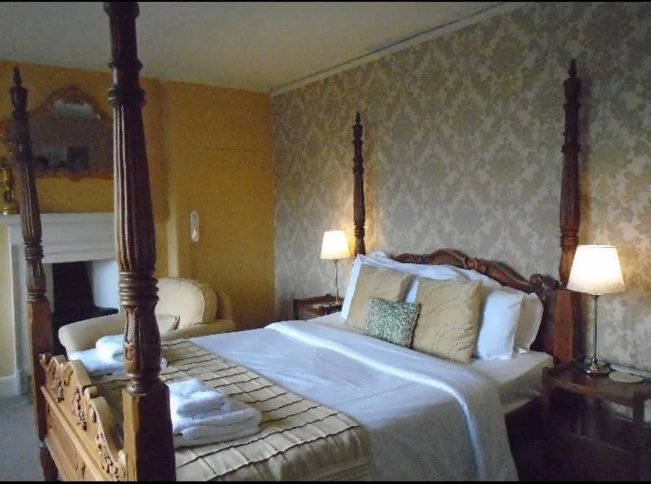 Bed in Rowley Manor hotel