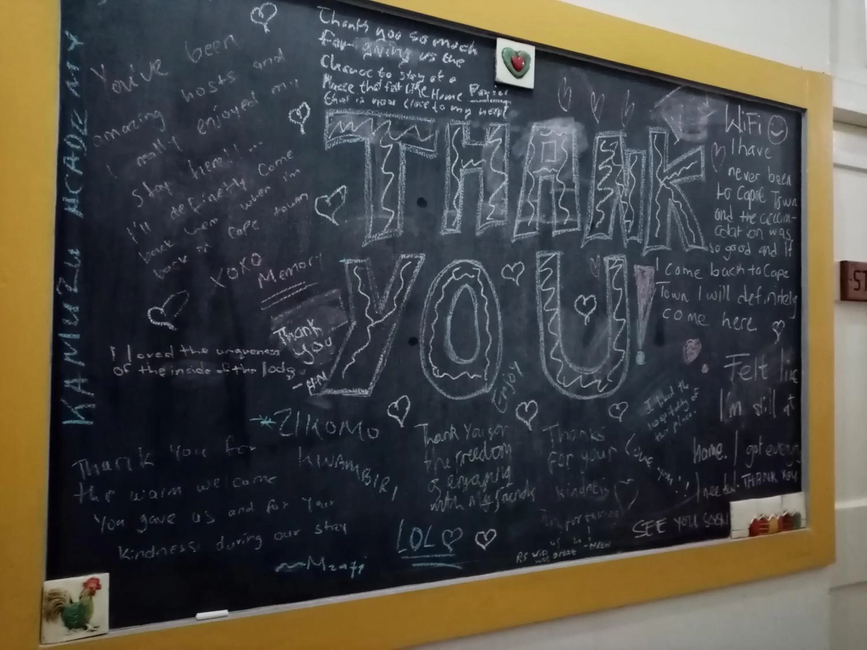 Property logo or sign in Lighthouse Farm Backpackers Lodge