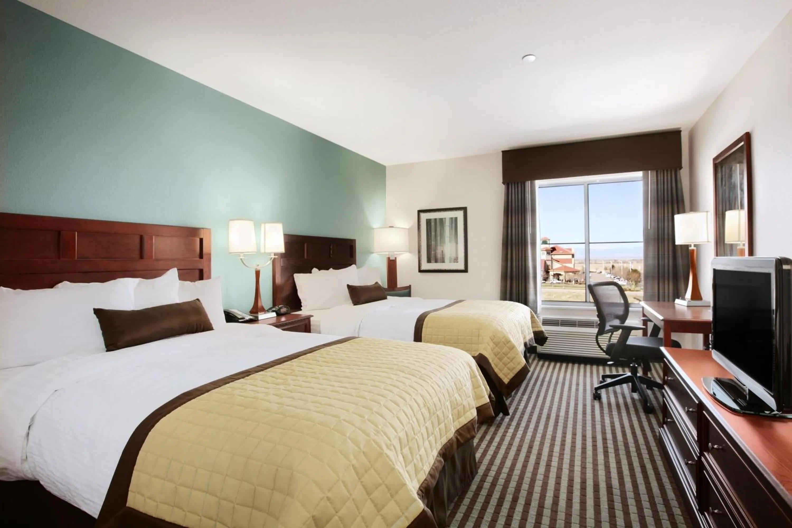 Photo of the whole room, Bed in Baymont by Wyndham Denver International Airport