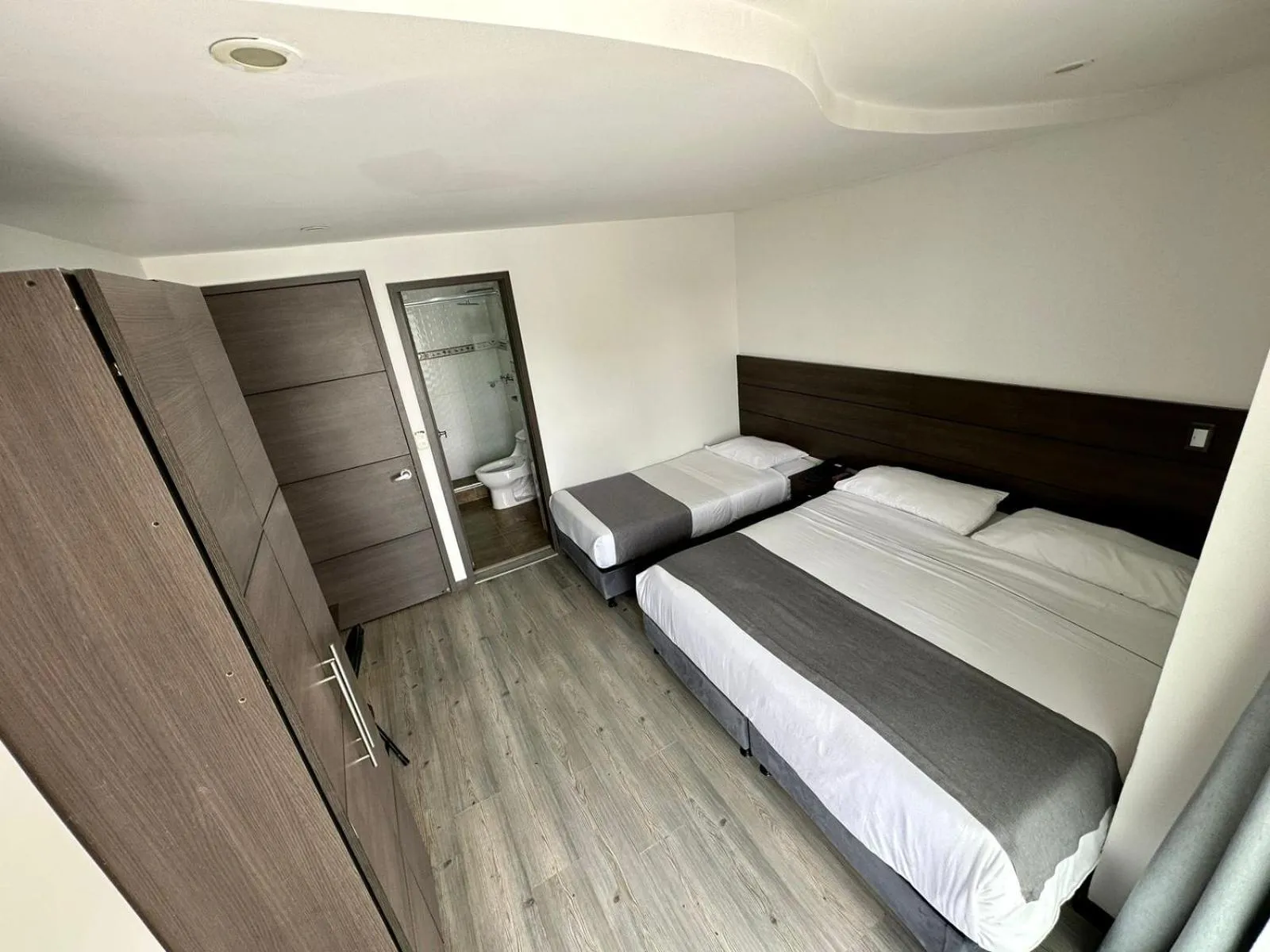 Bed in Hotel Expo Hotel Ferial
