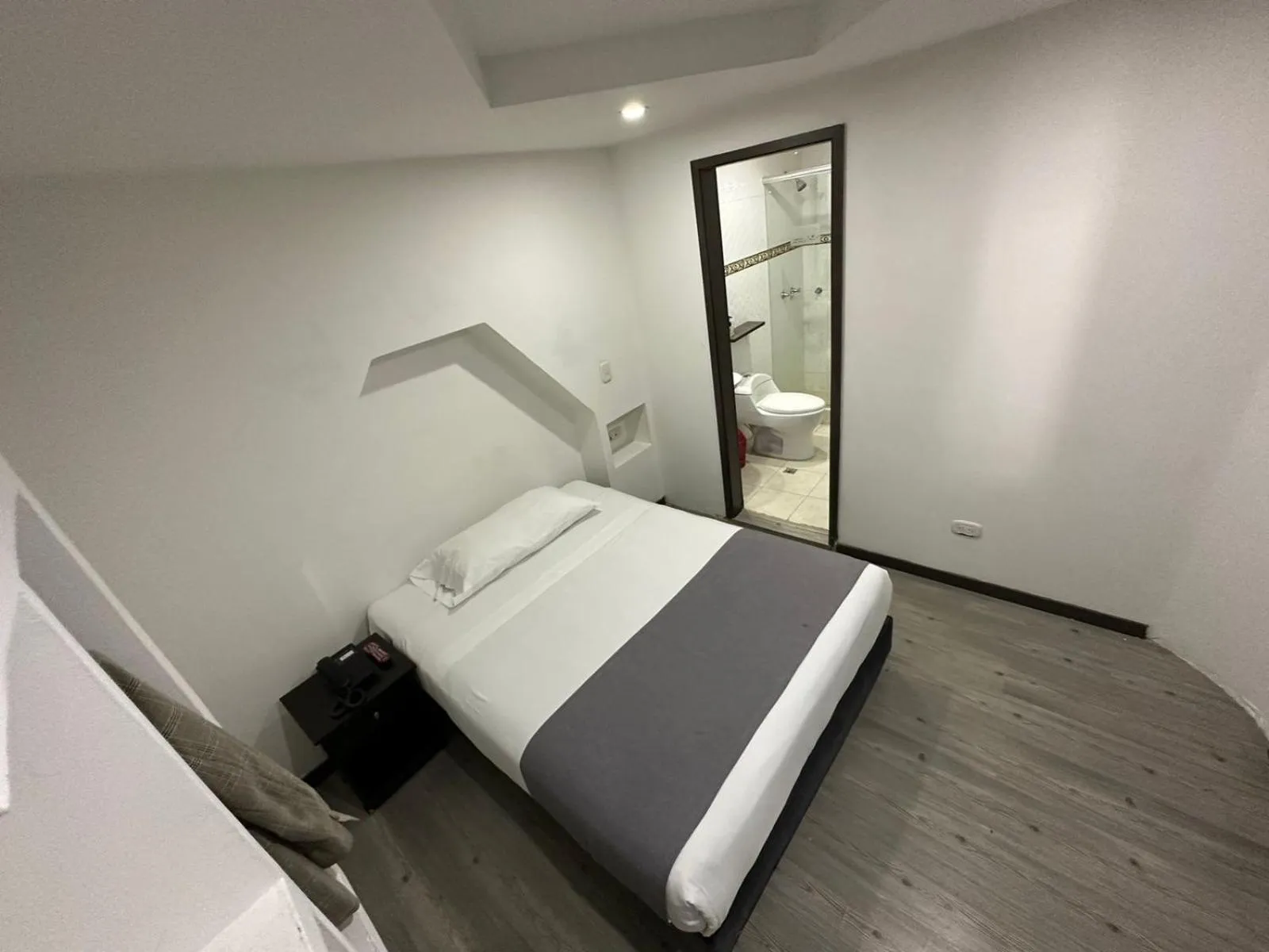 Bed in Hotel Expo Hotel Ferial