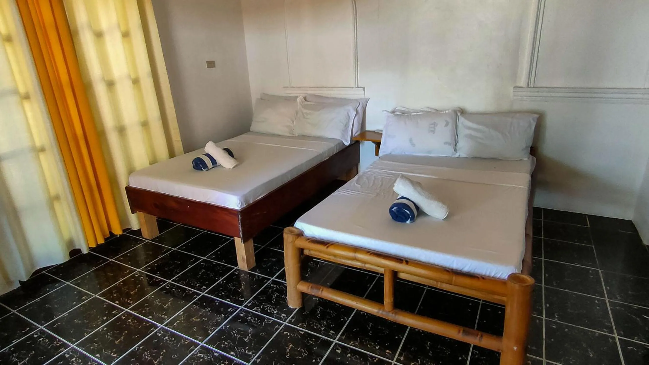 Bed in Isla Hayahay Beach Resort and Restaurant