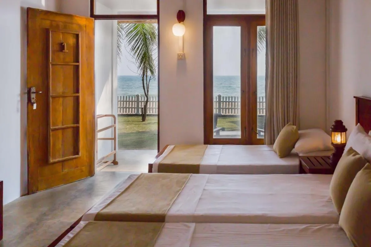 Bed in Pearl Oceanic Resort - Trincomalee