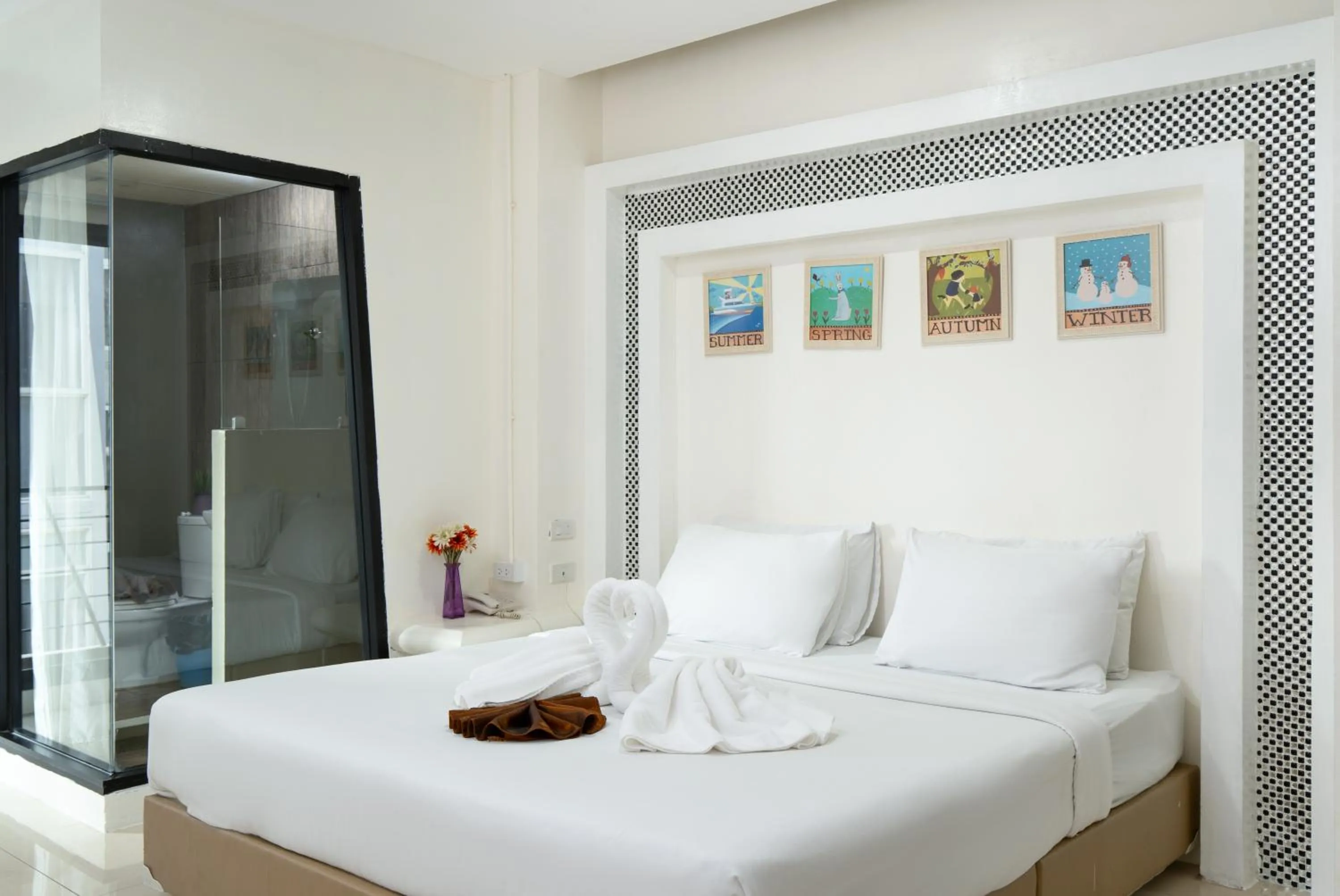 Bed in Baron Zotel Bangkok SHA PLUS