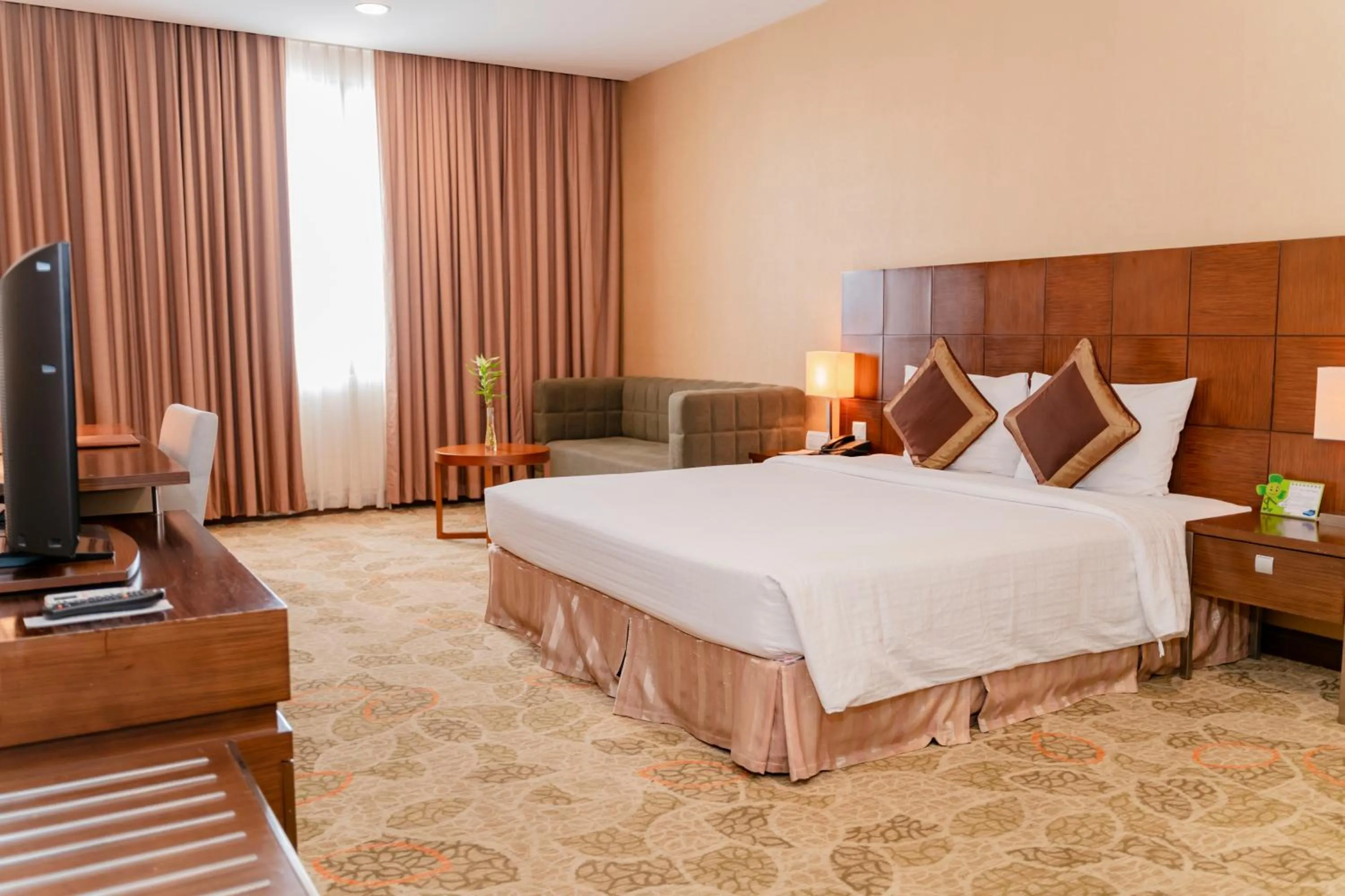 Bed in AURORA Hotel Plaza