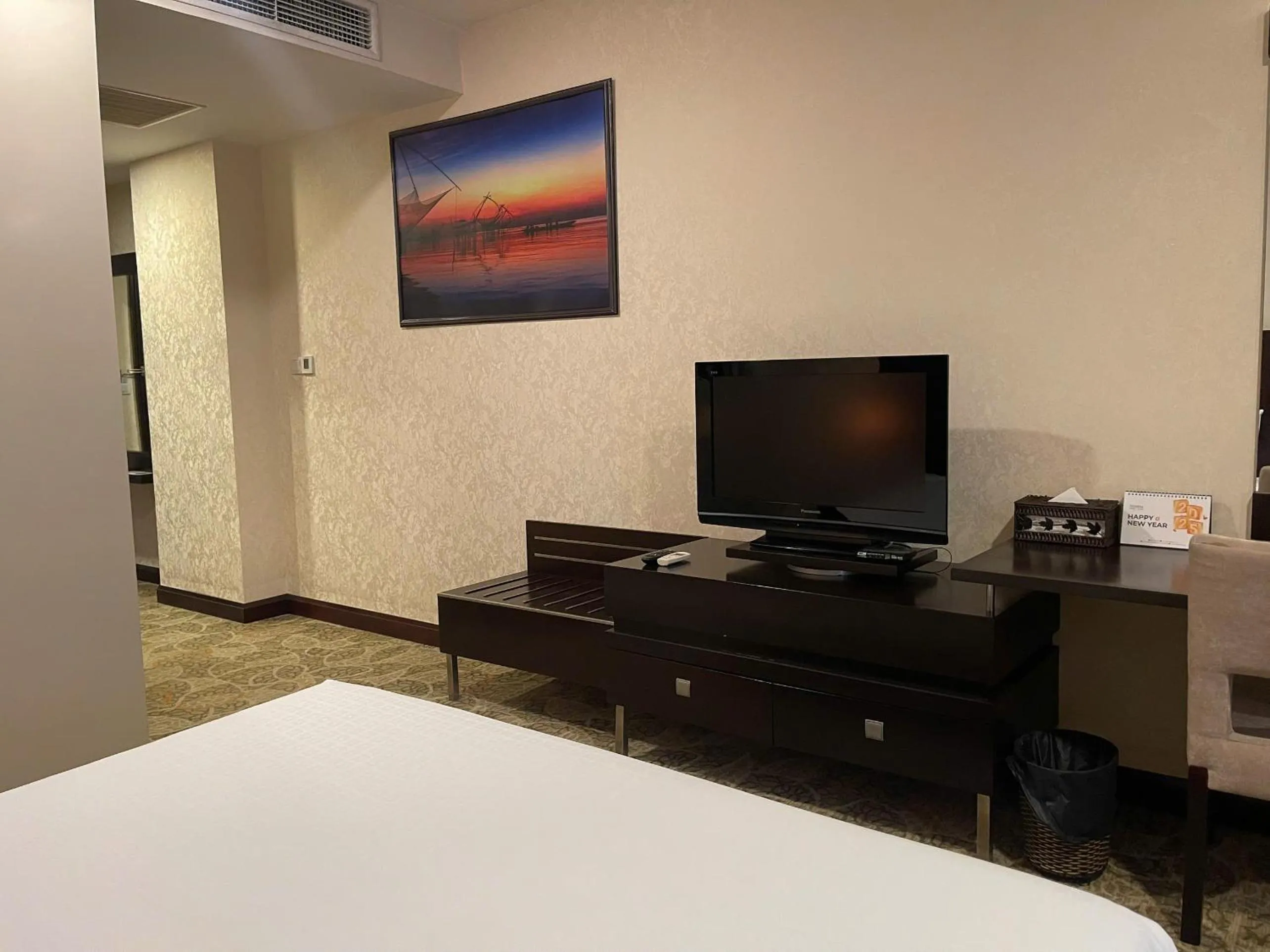 Bed in AURORA Hotel Plaza