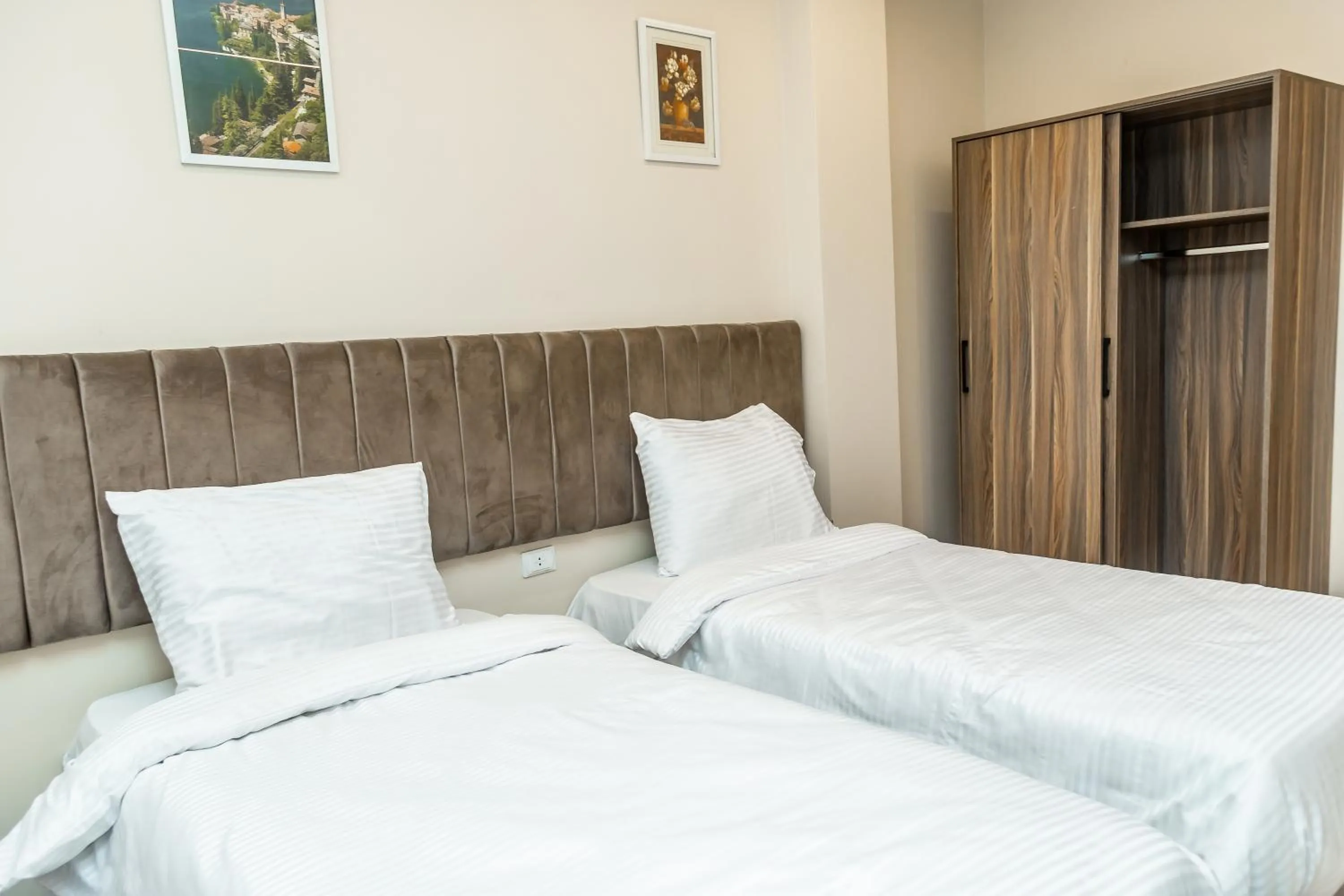 Bed in Night Pyramids Inn Hotel