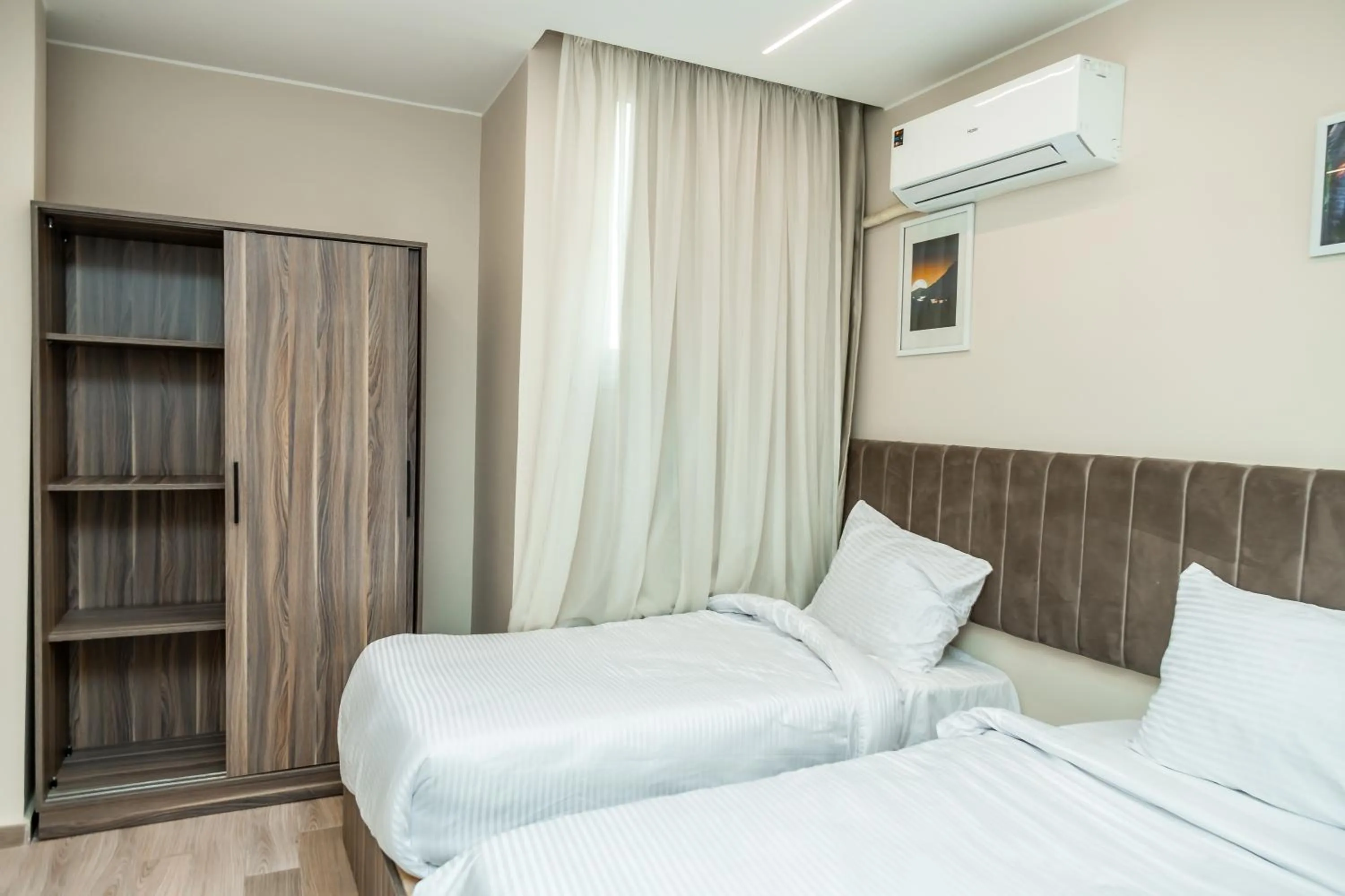 Bed in Night Pyramids Inn Hotel