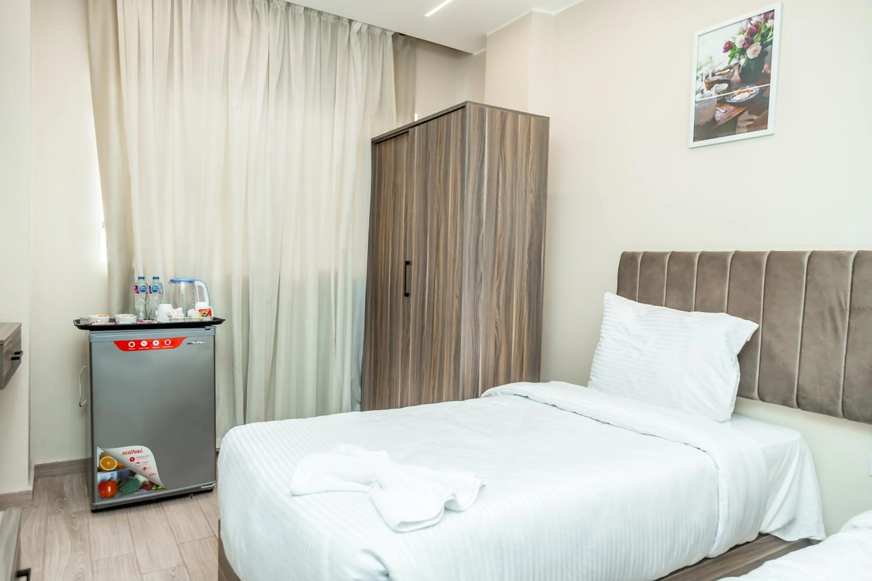 Bed in Night Pyramids Inn Hotel