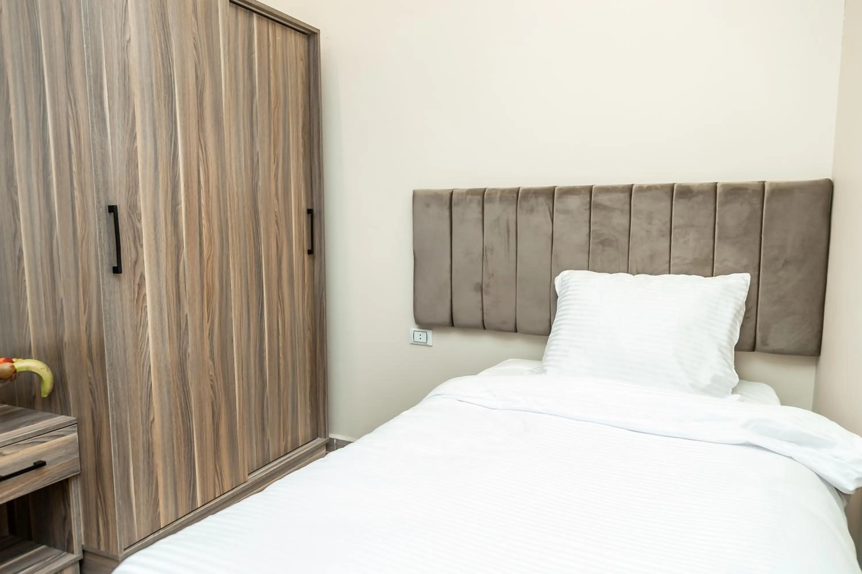 Bed in Night Pyramids Inn Hotel