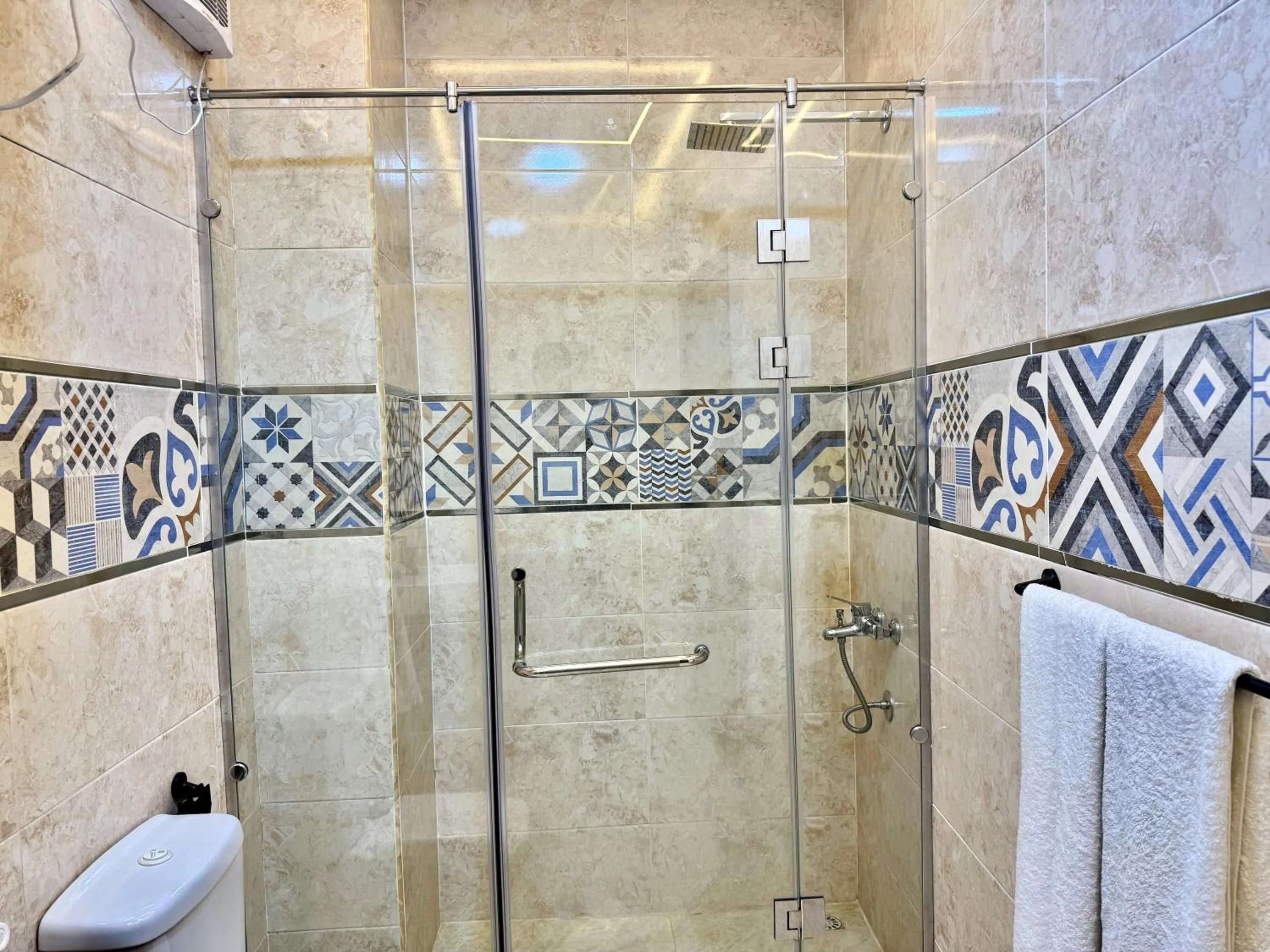 Shower in Night Pyramids Inn Hotel