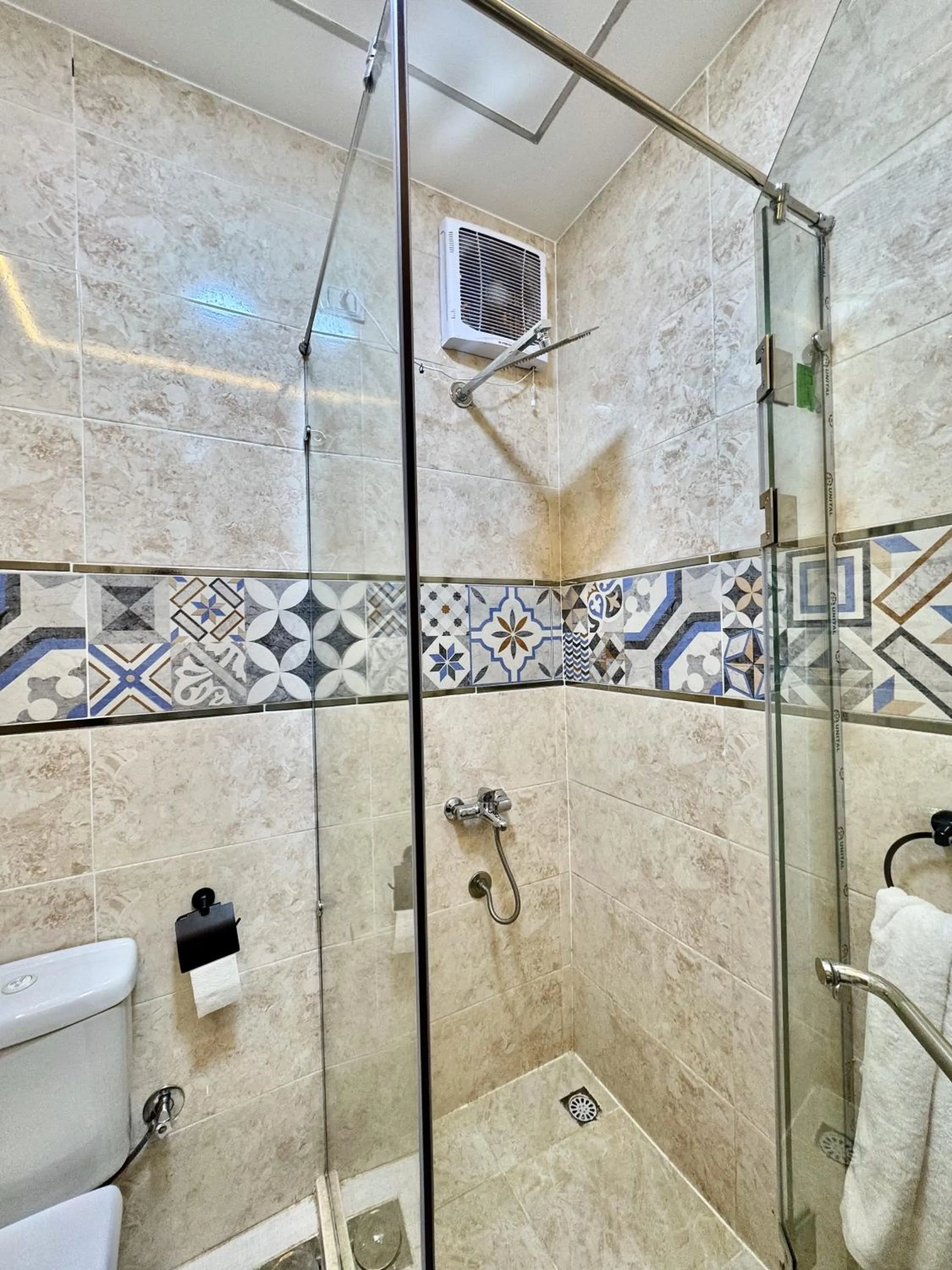 Shower in Night Pyramids Inn Hotel