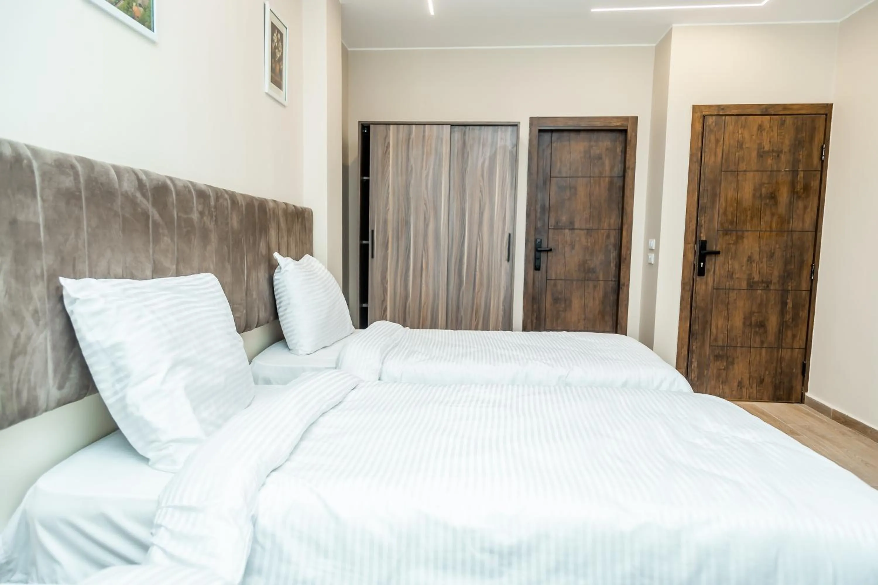 Bed in Night Pyramids Inn Hotel