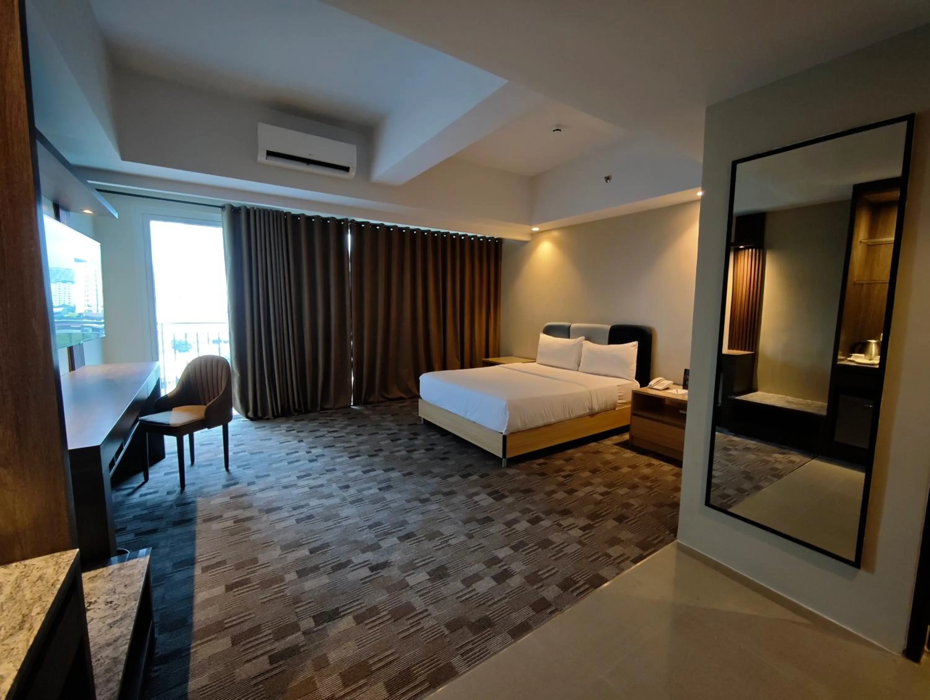 Bed in The Tribute Hotel