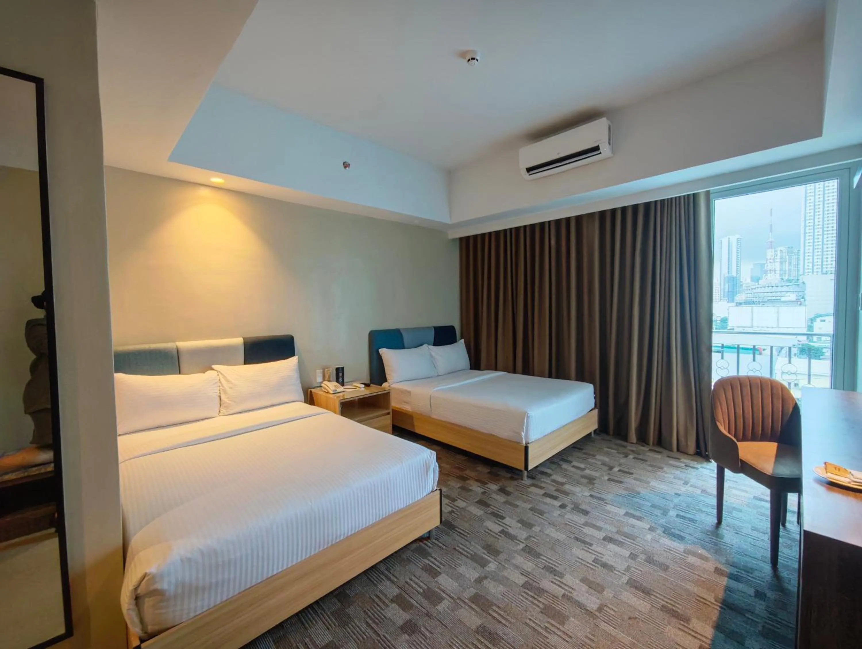 Bed in The Tribute Hotel