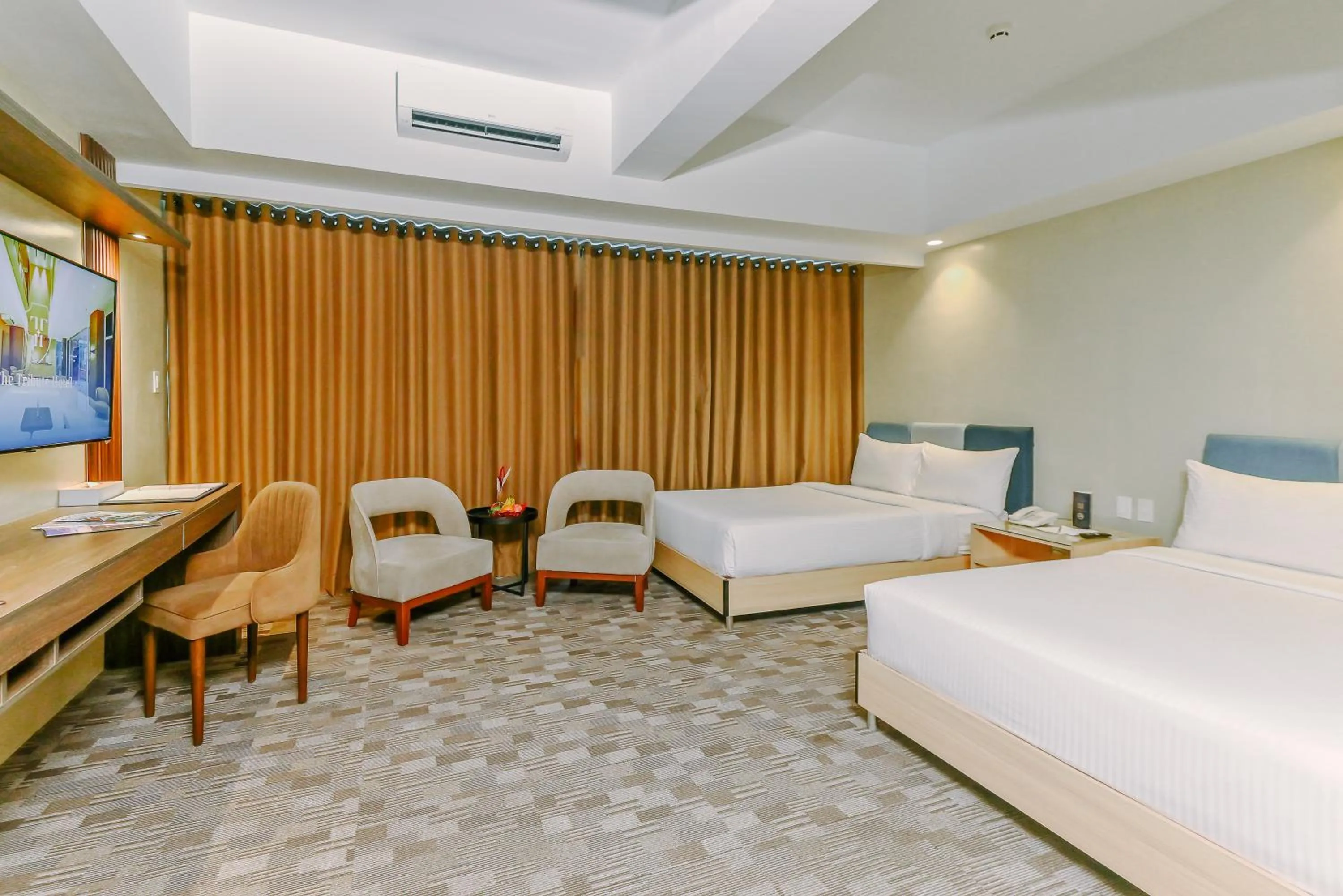 Bed in The Tribute Hotel