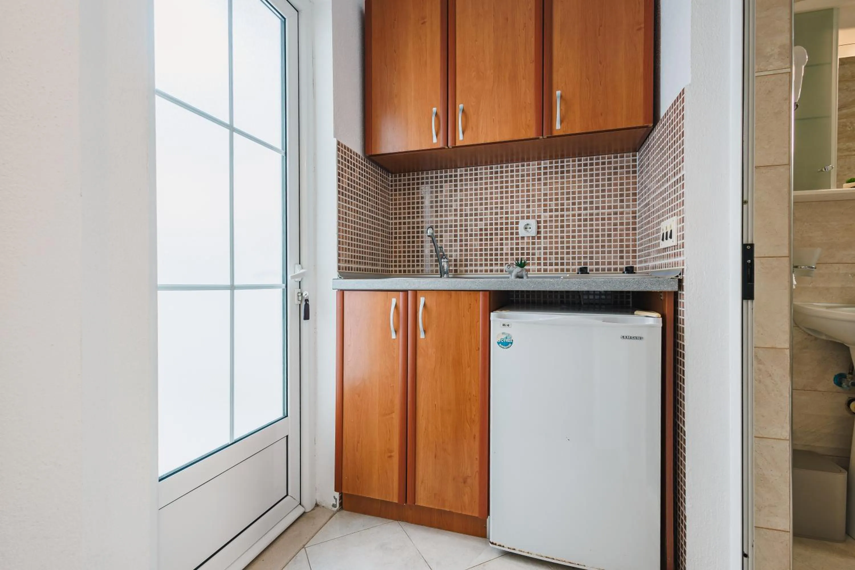 Kitchen or kitchenette in Villa Oleander