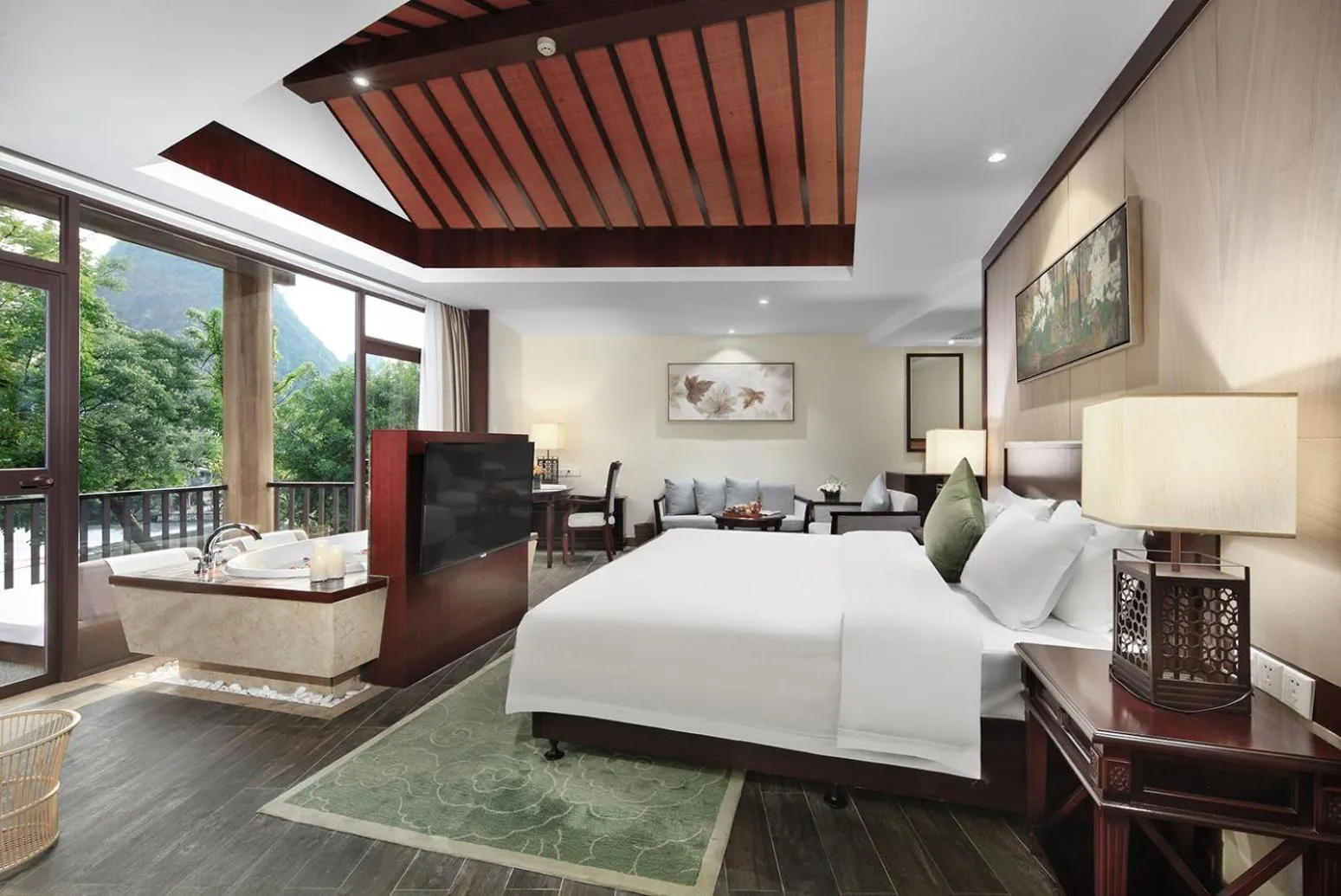 Photo of the whole room, Bed in Yangshuo Riverside Resorts Hotel