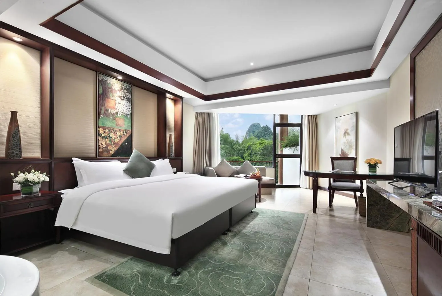 Photo of the whole room, Bed in Yangshuo Riverside Resorts Hotel