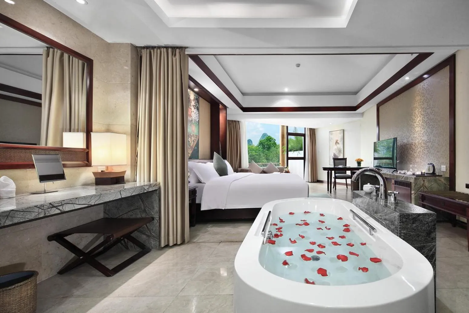 Photo of the whole room, Bed in Yangshuo Riverside Resorts Hotel