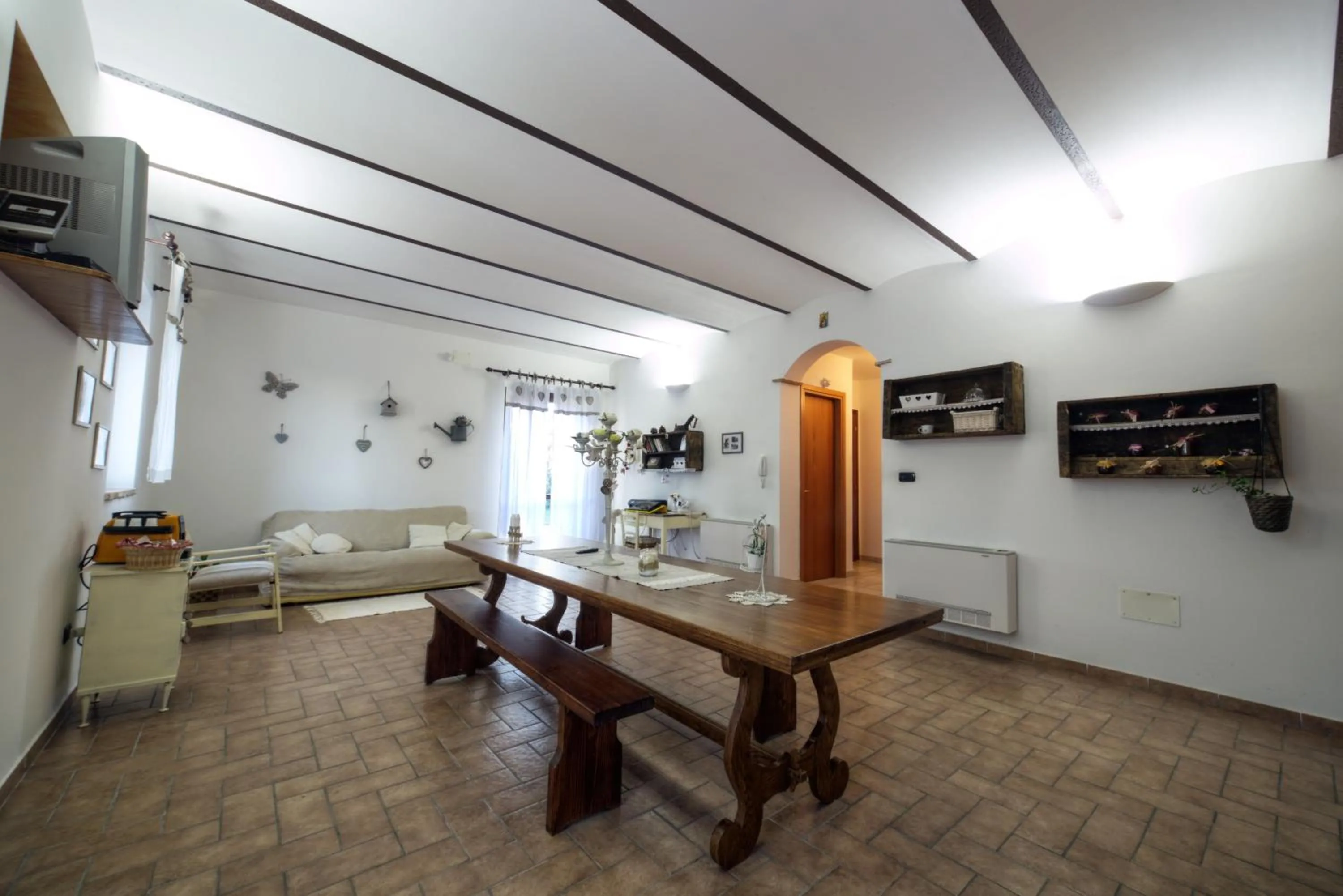 Communal lounge/ TV room in Affittacamere le Querce
