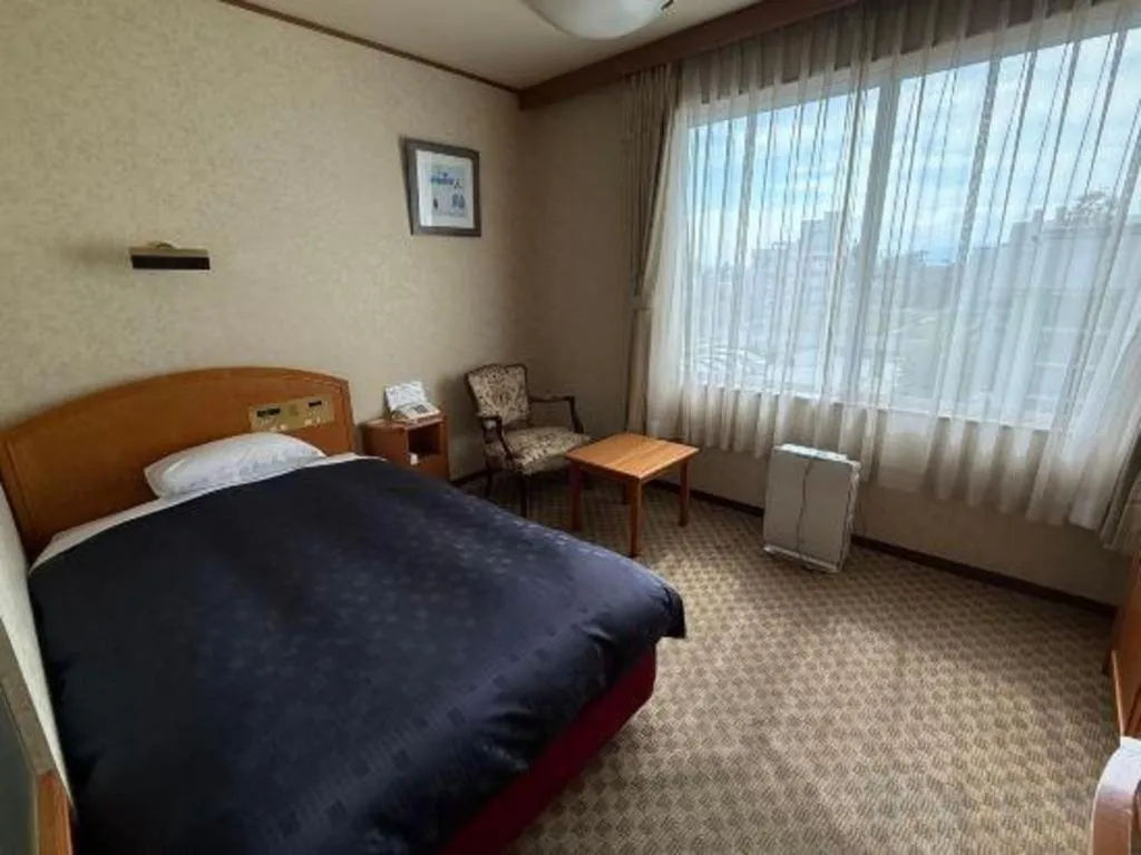 Bed in Gifu Grand Hotel