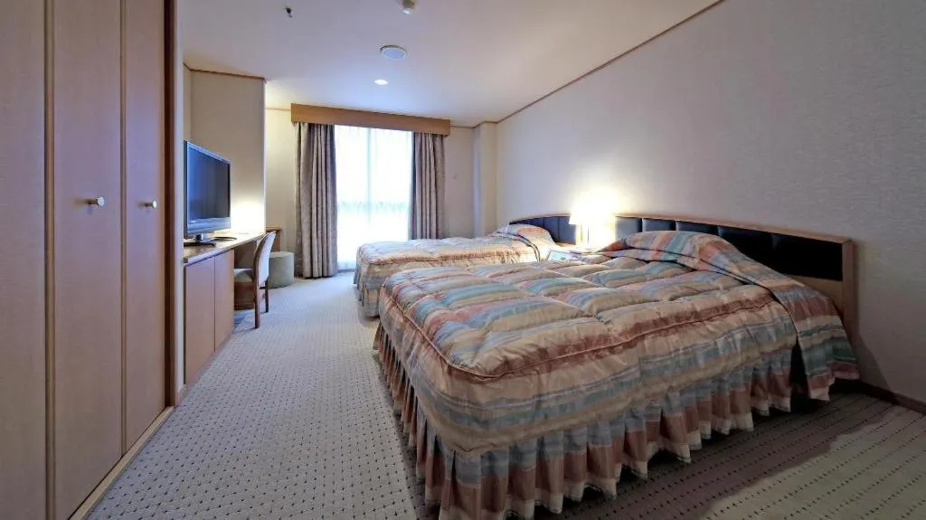 Bed in Gifu Grand Hotel