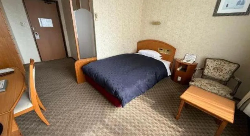 Bed in Gifu Grand Hotel