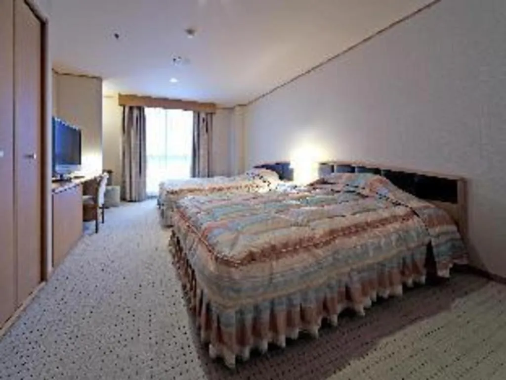 Bed in Gifu Grand Hotel