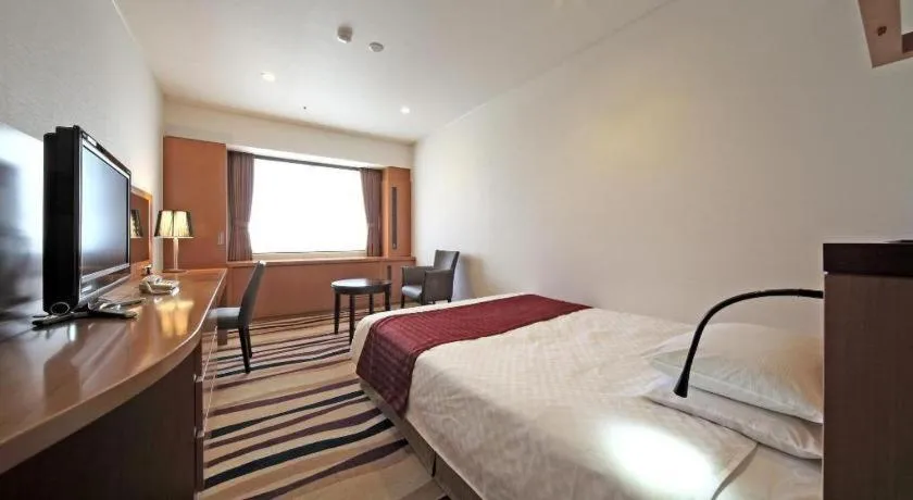 Bed in Gifu Grand Hotel