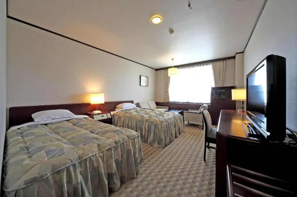 Bed in Gifu Grand Hotel