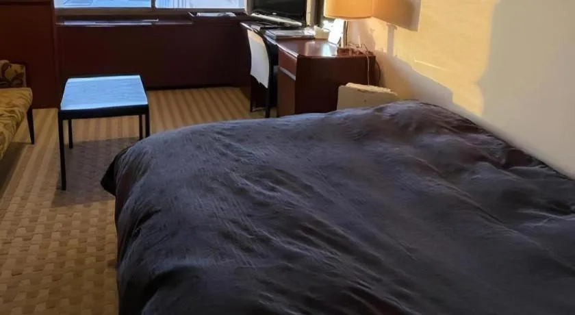 Bed in Gifu Grand Hotel